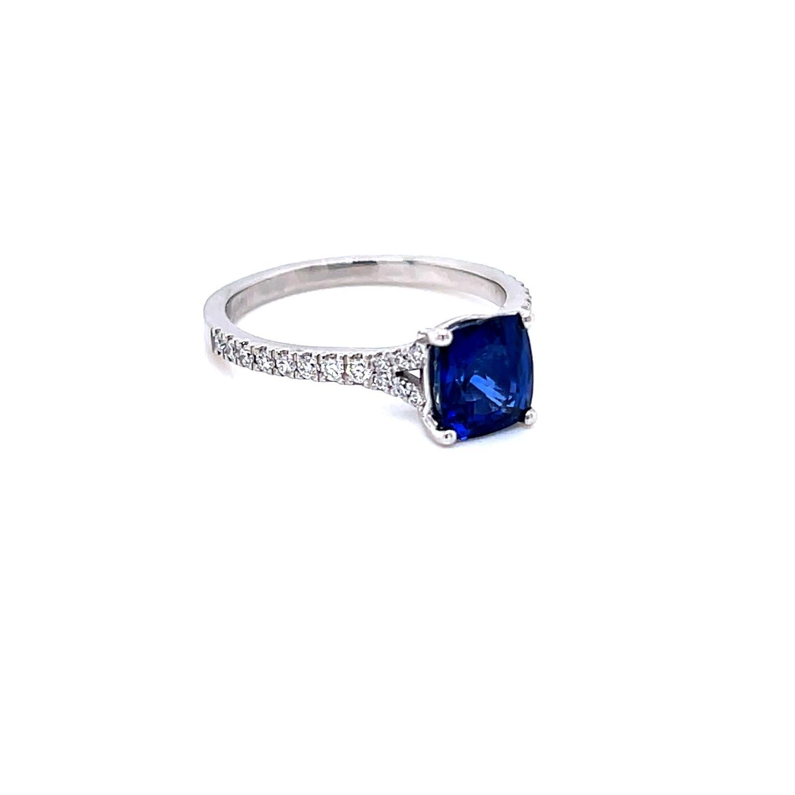 1.52 Carat cushion cut Blue Sapphire and Diamond Platinum Ring 

This elegant ring features a 1.52 carat cushion cut Blue Sapphire at its centre. This gorgeous stone emanates depth and allure, with its captivating midnight blue hues captivating