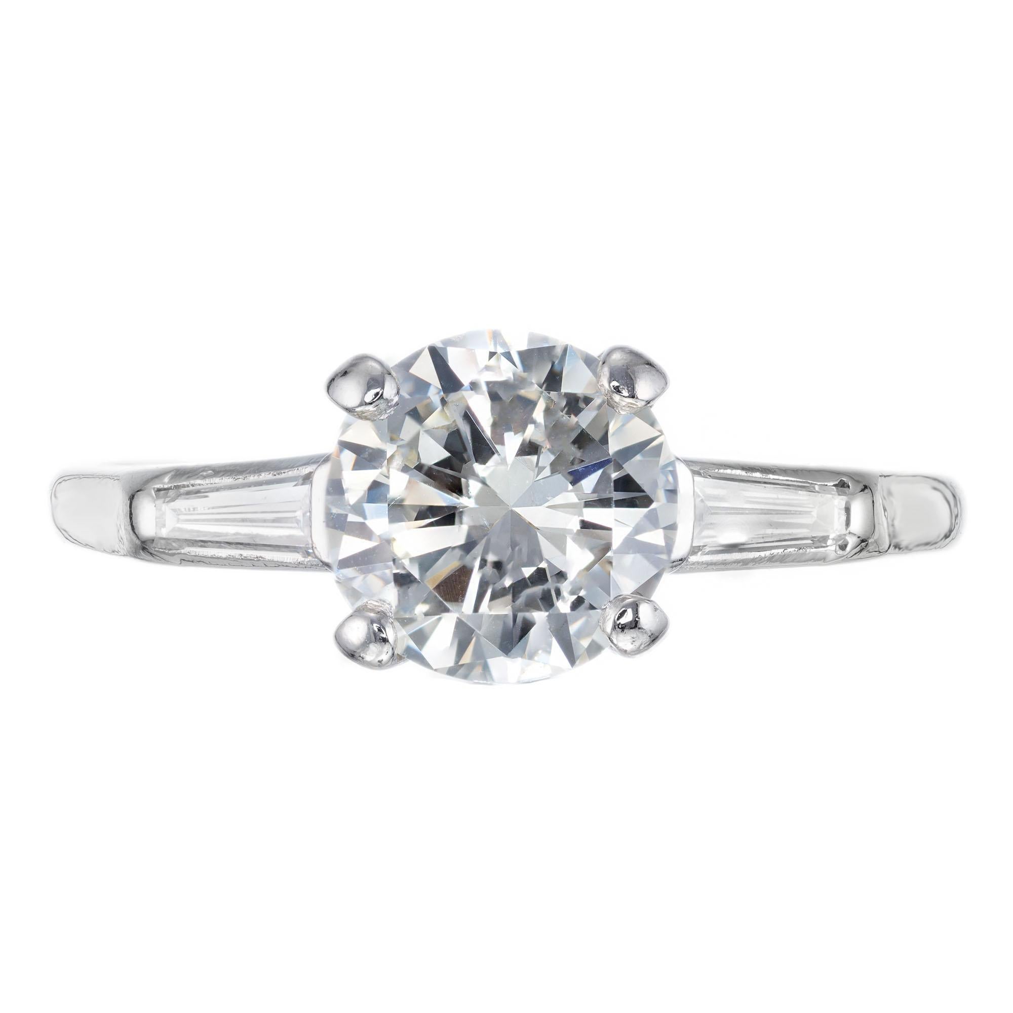 1940's late Art Deco transitional Ideal cut diamond platinum engagement Ring. EGL certified center stone with two baguette side diamonds in a platinum setting. 

1 transitional brilliant cut diamond, approx. total weight 1.52cts, J, SI1, 7.60 x 7.58