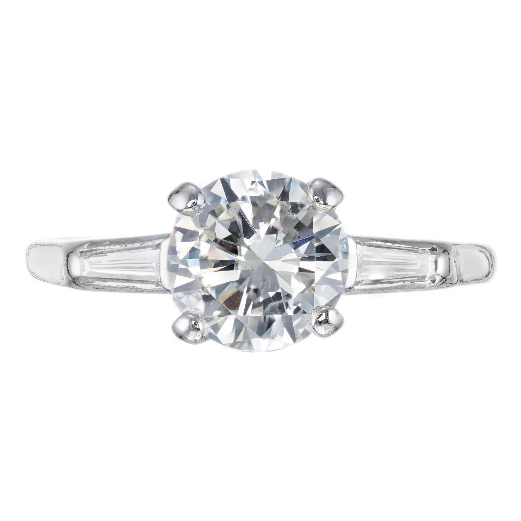 1940's late Art Deco transitional Ideal cut diamond platinum engagement Ring. EGL certified center stone with two baguette side diamonds in a platinum setting. 

1 transitional brilliant cut diamond, approx. total weight 1.52cts, J, SI1, 7.60 x 7.58