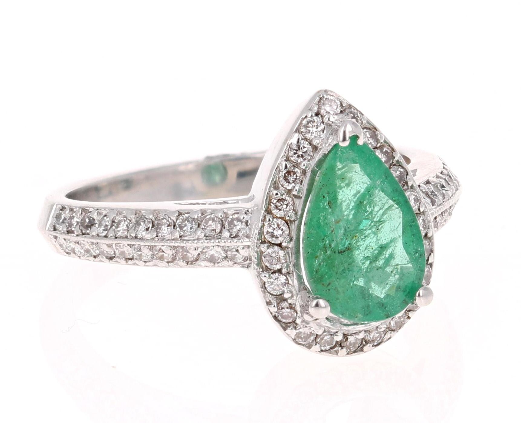 A simple setting with a beautiful natural Pear Cut Emerald that weighs 1.12 Carats, surrounded by 64 Round Cut Diamonds weighing 0.40 Carats. The total carat weight of the ring is 1.52 Carats. 

The Pear Cut Emerald measures at 9 mm x 6 mm and the