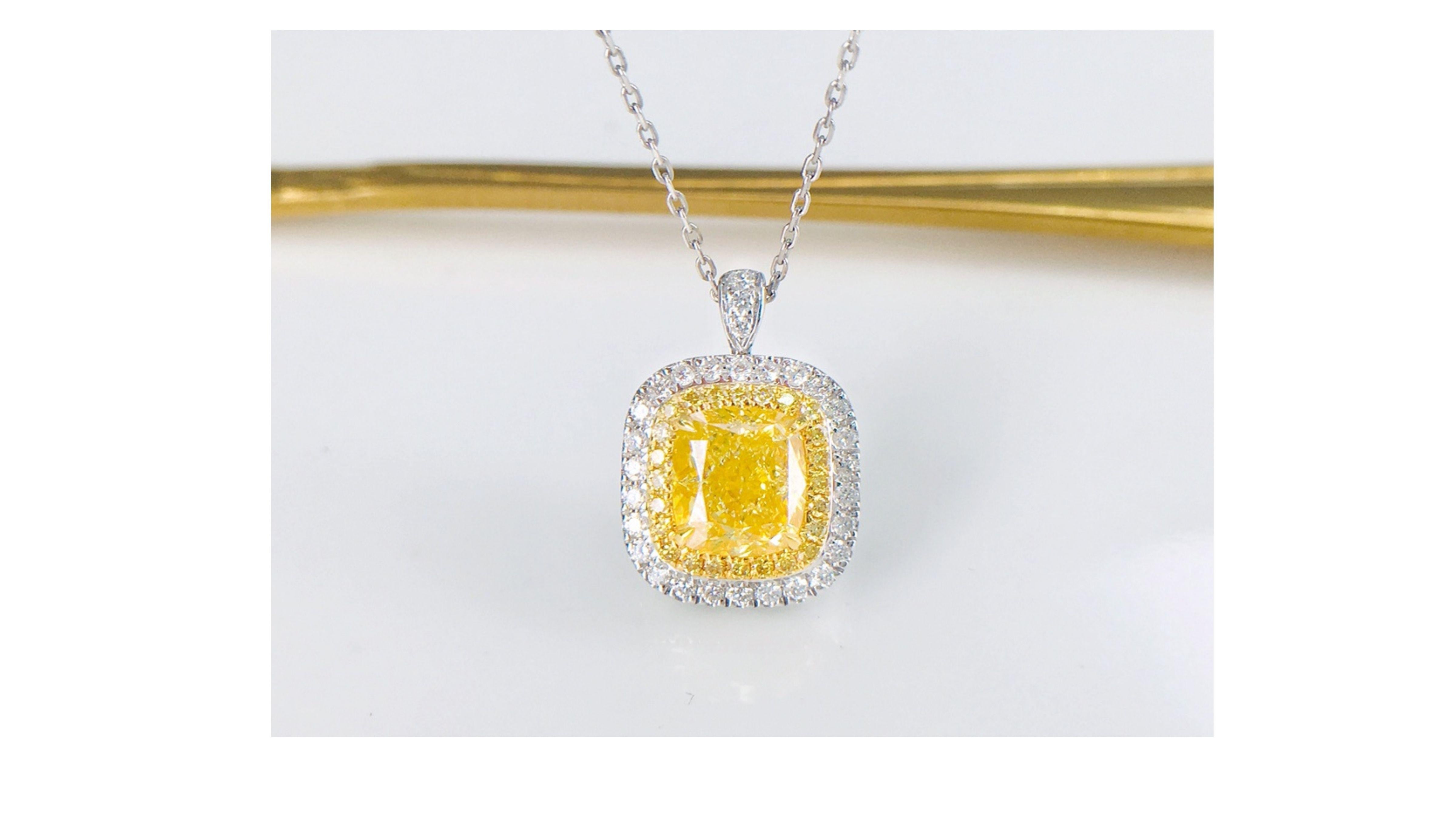 Contemporary 1.52 Carat Fancy Yellow Diamond Ring 18K White Gold For Sale