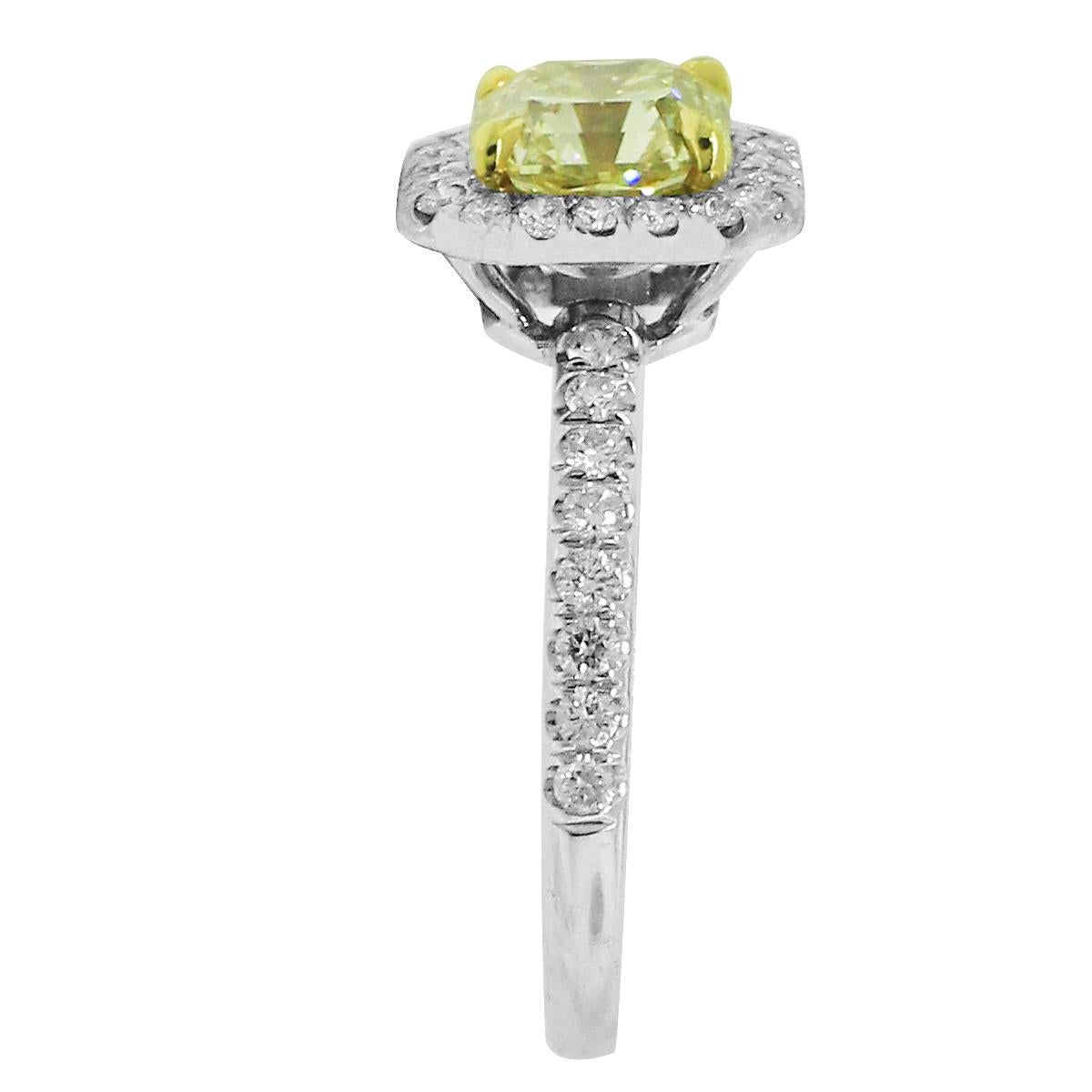Material: 18k White Gold
Diamond Details: Center diamond is 1.52ct Fancy yellow and VS1 in clarity. GIA Certified #1162034730
Accent Diamond Details: Approximately 0.32ctw accent diamonds. Accent diamonds are H/I in color and SI in clarity.
Ring