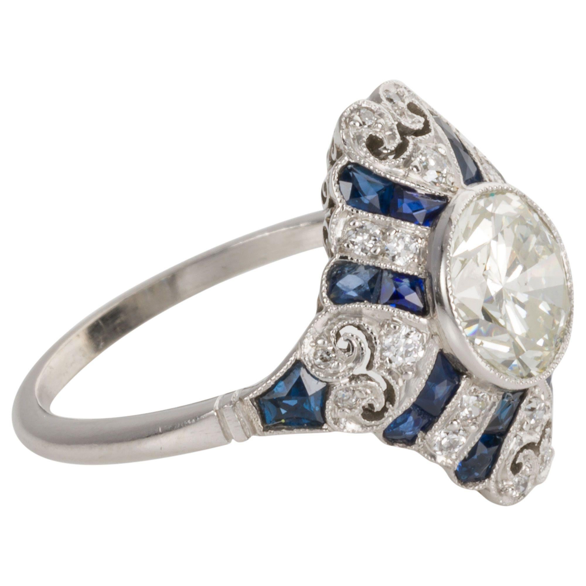 Reminiscing about the Art Deco period and the fabulous style of jewellery that was created. This Deco inspired ring has all the timeless and elegant features of days gone by - from the central 1.52 carat old European cut diamond, the single cut