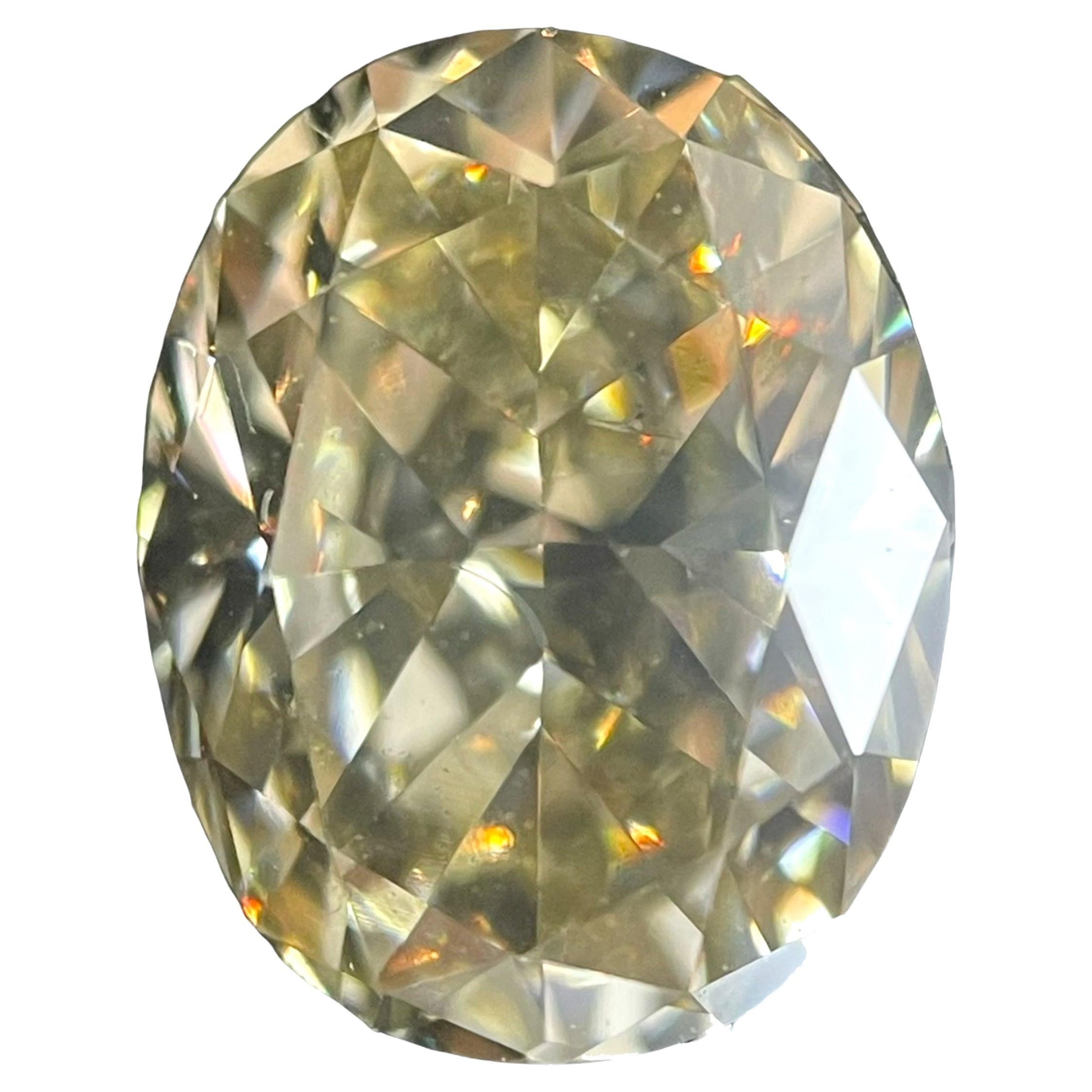 Diamant ovale de 1,52 carat de pureté jaune brunâtre fantaisie certifié par le GIA, SI1