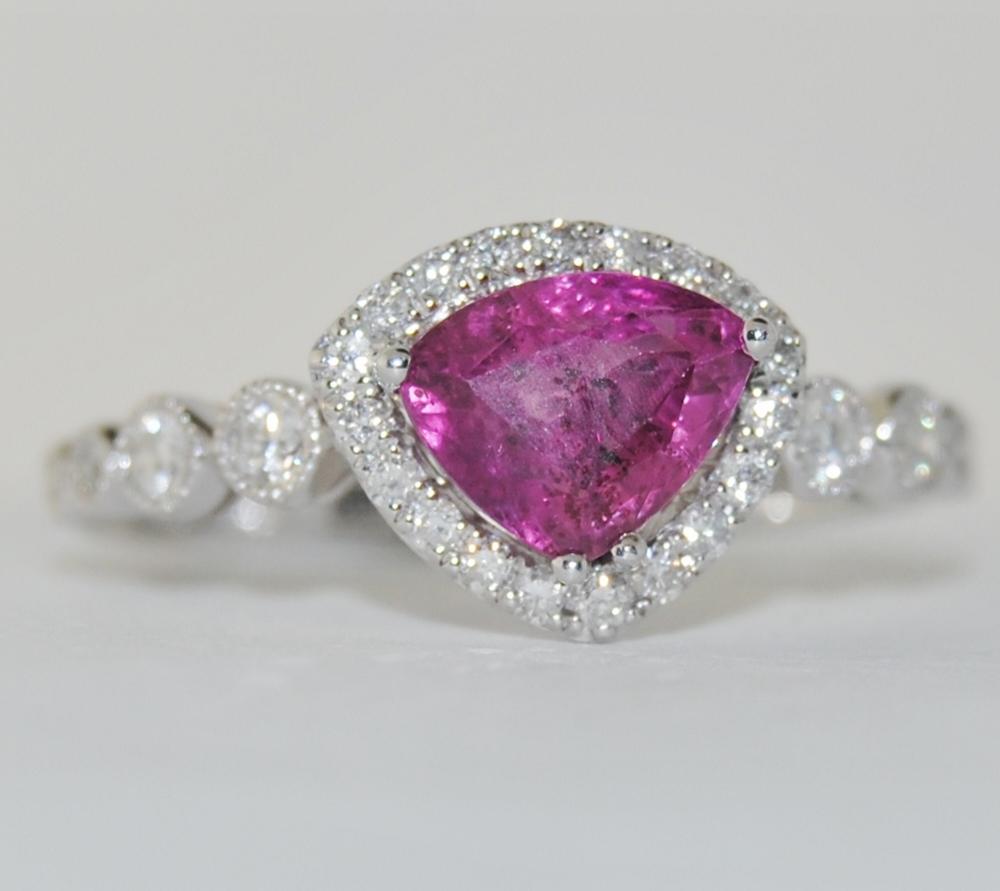 18K white gold cocktail ring featuring 1.52 carat triangular Ruby and 0.31 carats round brilliant white diamonds.  New ring, size 6.75