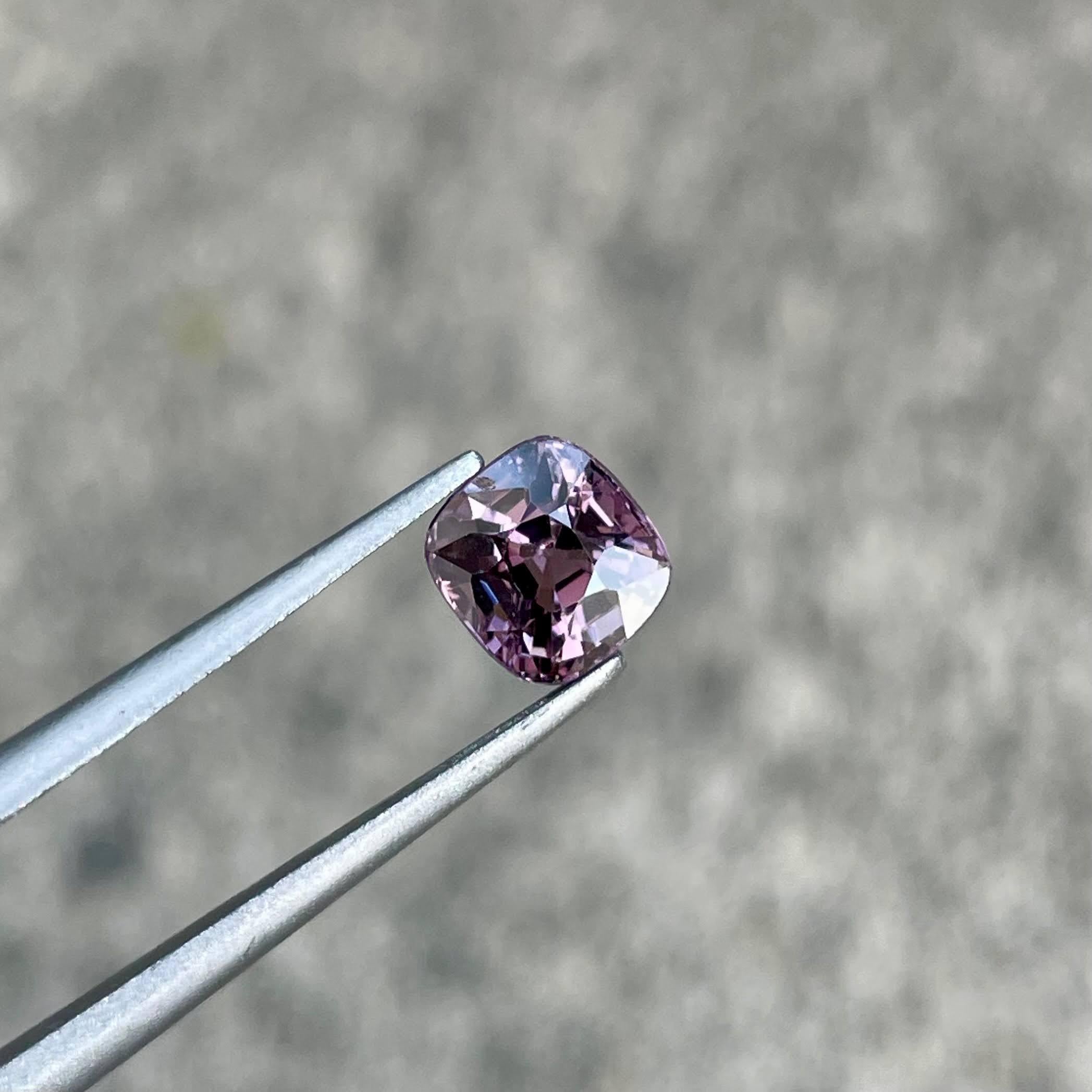 Weight 1.52 carats 
Dimensions 6.3x5.8x4.9 mm
Treatment none 
Origin Burma 
Clarity SI
Shape cushion 
Cut faceted 



This exquisite 1.52 carat Burmese spinel showcases a captivating purplish pink hue, making it a rare and desirable gemstone for
