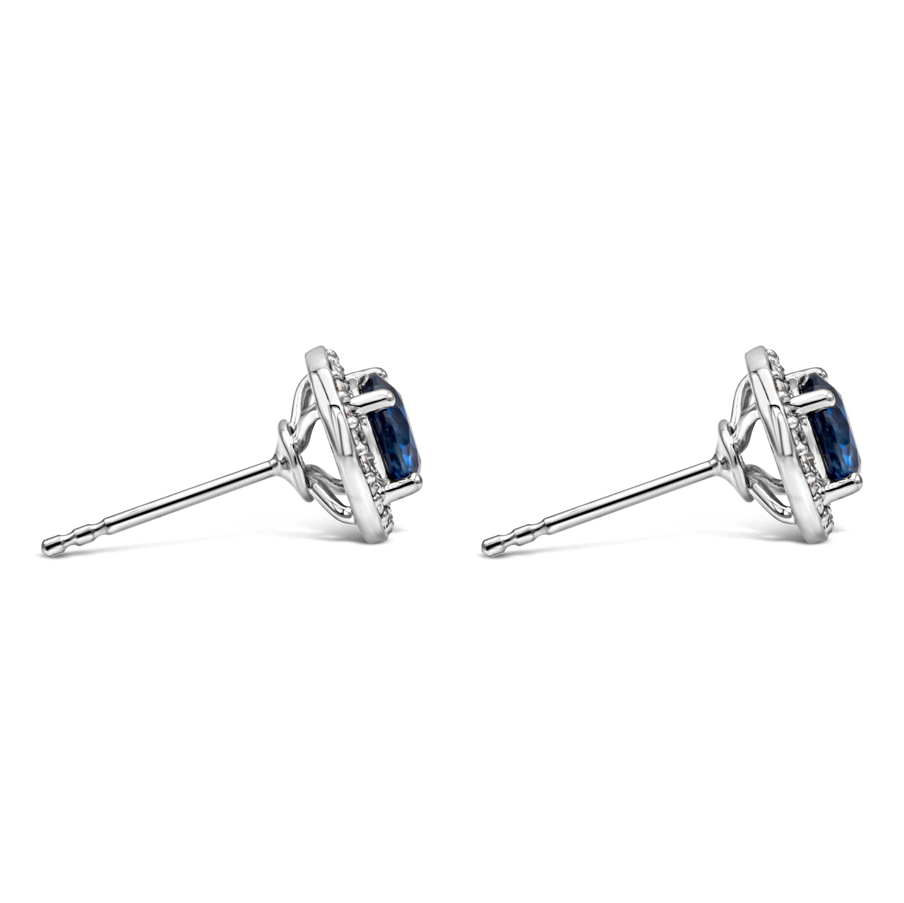 Contemporary 1.52 Carats Total Round Cut Royal Blue Sapphire and Diamond Halo Stud Earrings For Sale