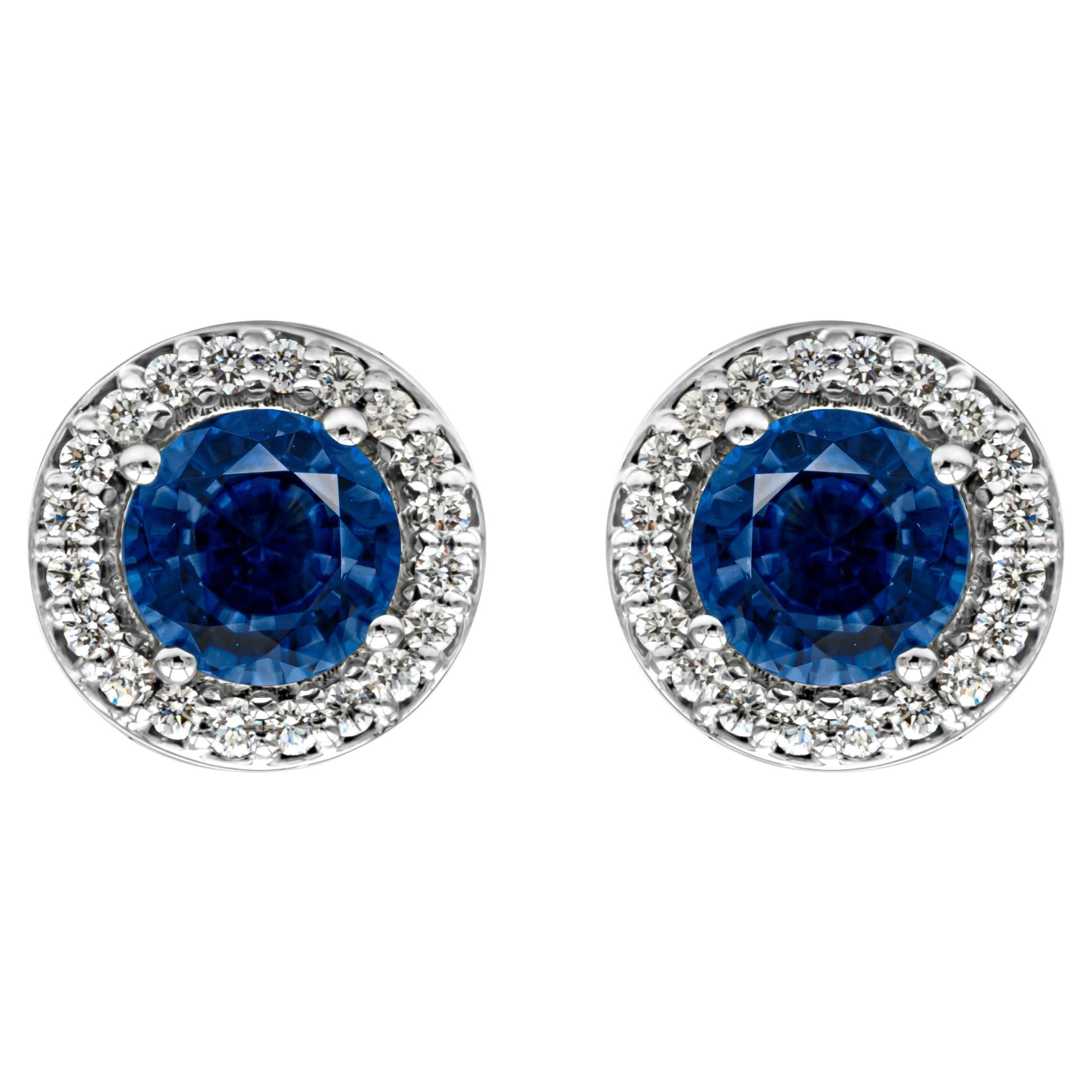 1.52 Carats Total Round Cut Royal Blue Sapphire and Diamond Halo Stud Earrings For Sale