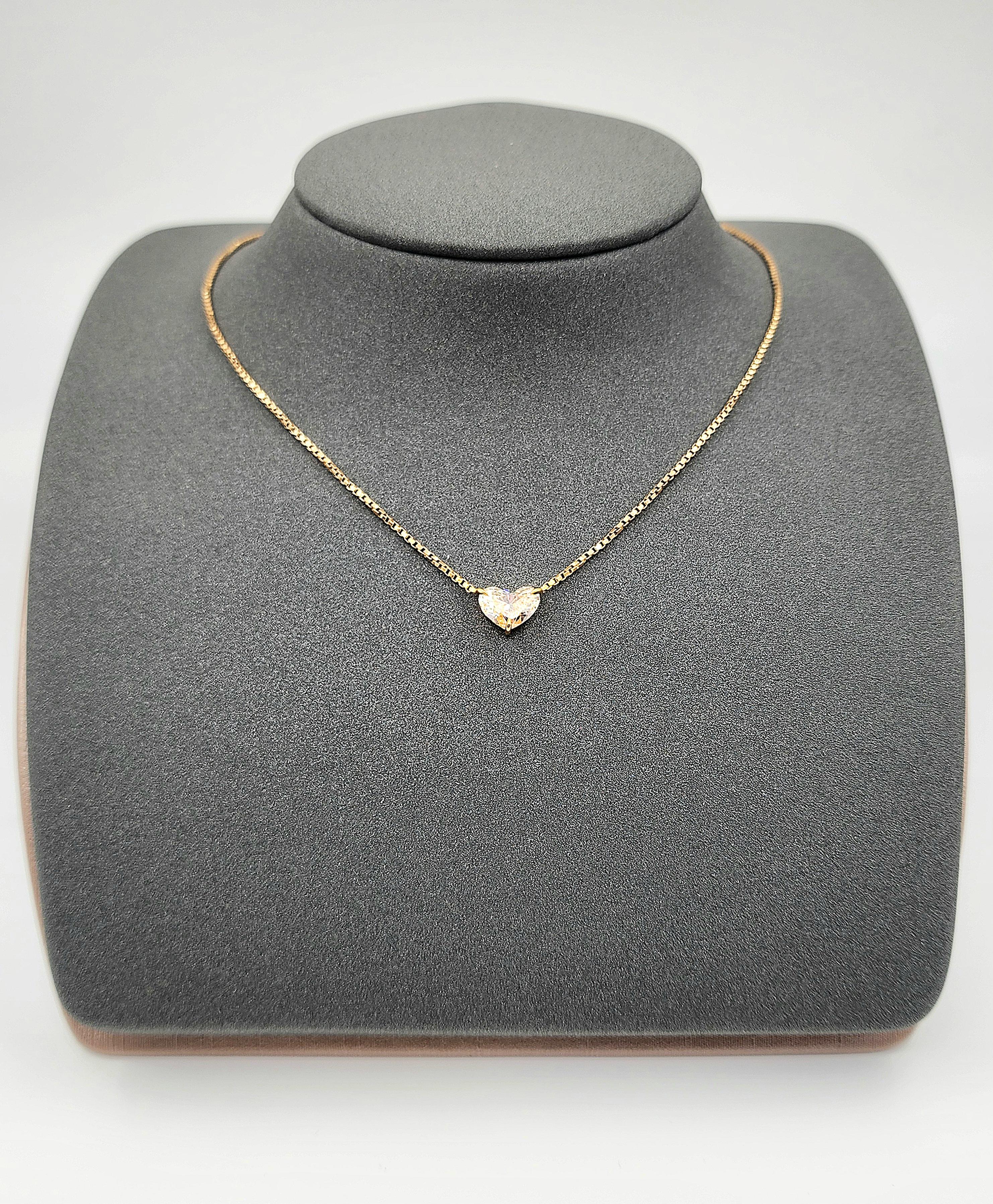 This gorgeous natural yellow diamond pendant is 3-prong martini set in 14k yellow gold. The diamond is SI1 in clarity and a definite conversation piece. 