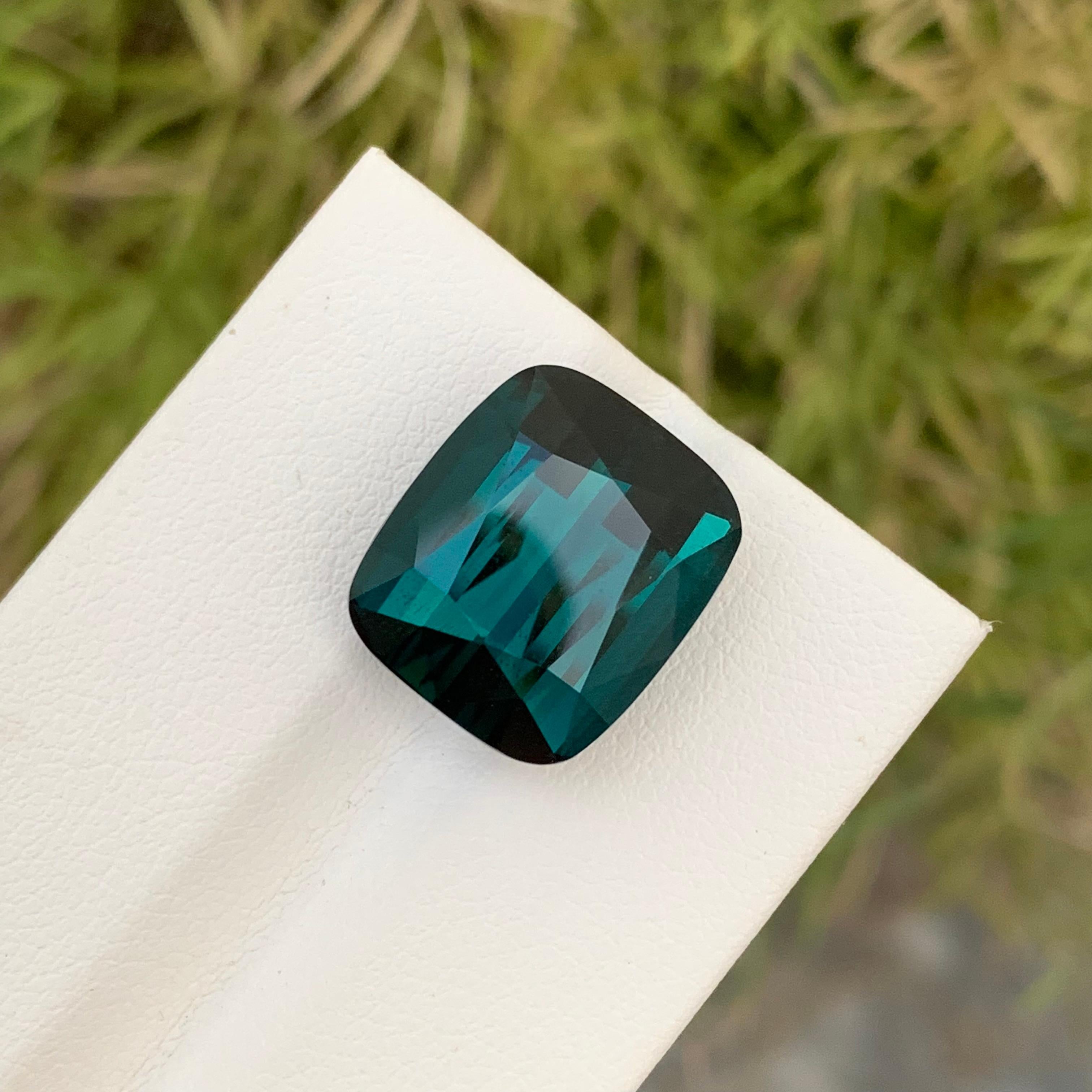 Loose Indicolite Tourmaline
Weight: 15.20 Carats
Dimension: 15 x 12.9 x 9.6 Mm
Colour: Blue
Origin: Afghanistan
Treatment: Non
Certificate: On Demand

Indicolite tourmaline, prized for its stunning blue hues ranging from serene sky blues to deep