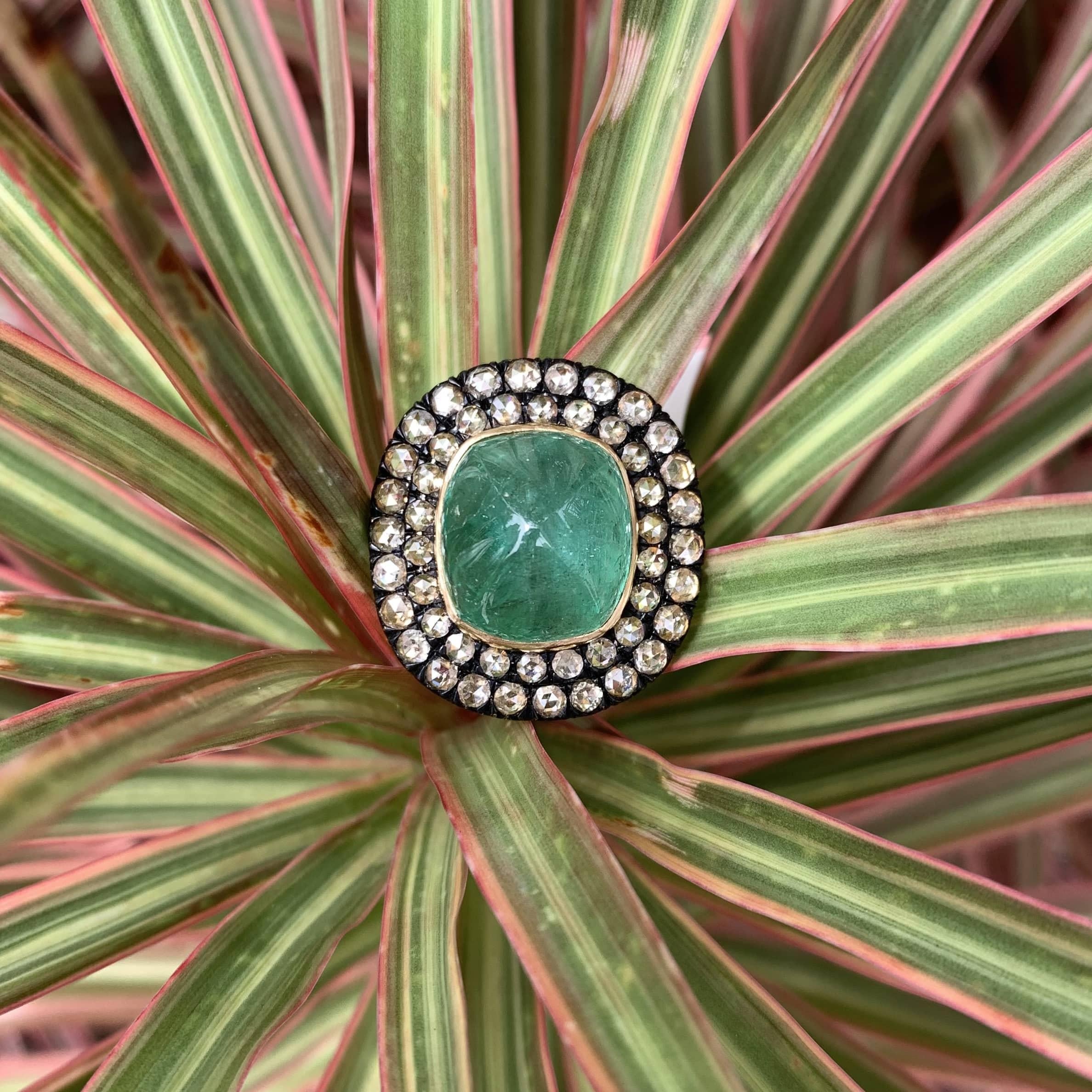 Introducing the graceful Art Deco Inspired Emerald Ring, a true masterpiece designed to fascinate and enthrall an emerald lover. This enchanting piece is handcrafted to embody the elegance of bygone eras, making it an ideal statement ring for those