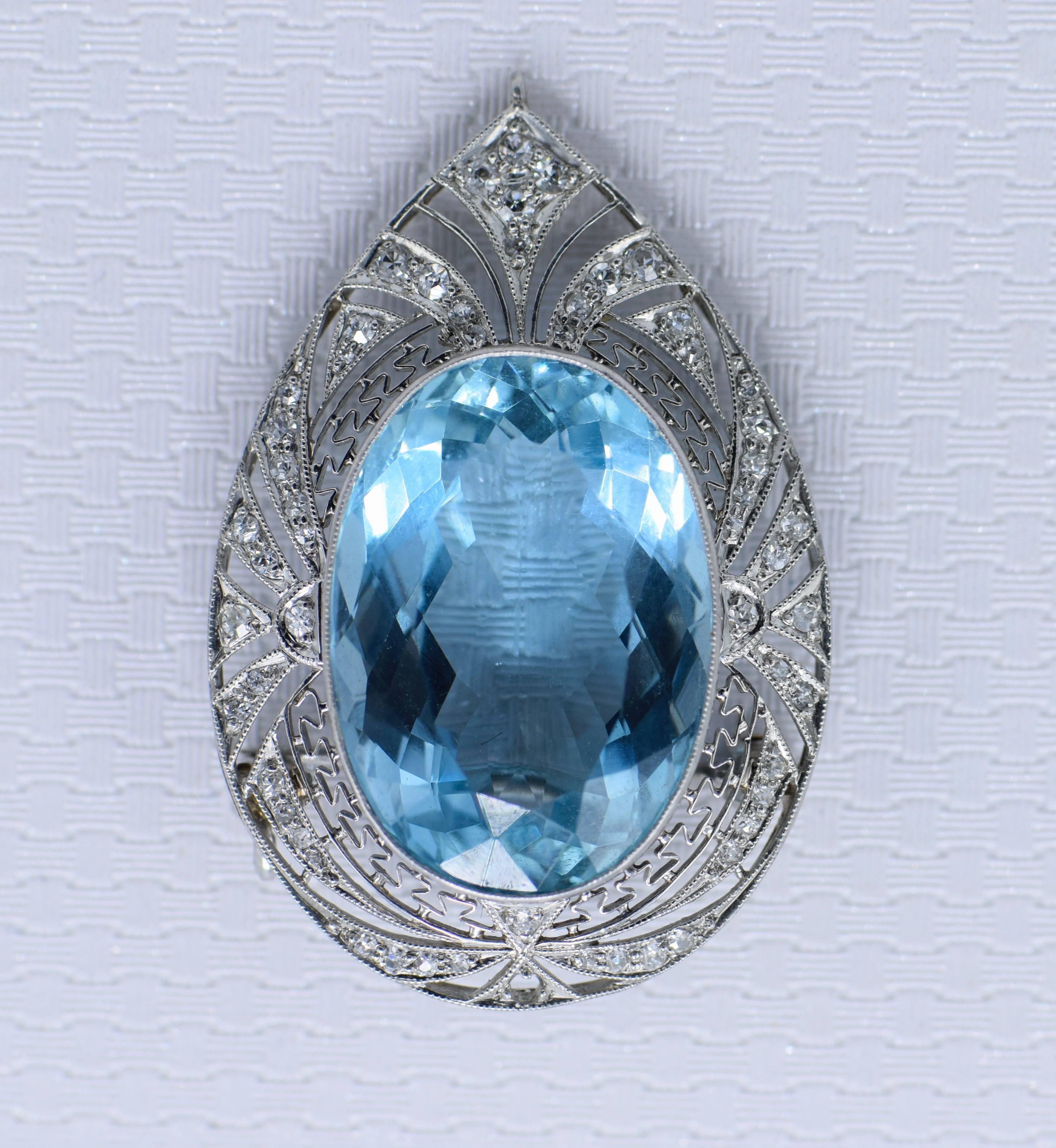 One oval aquamarine ap. 15.25 cts., small old-mine & single-cut diamonds, c. 1915, ap. 6 dwts. 

Aquamarine: medium sky blue around table, lighter faintly greenish-blue in center, cleanish, minor abrasions on culet junction, nice shape and cut, very