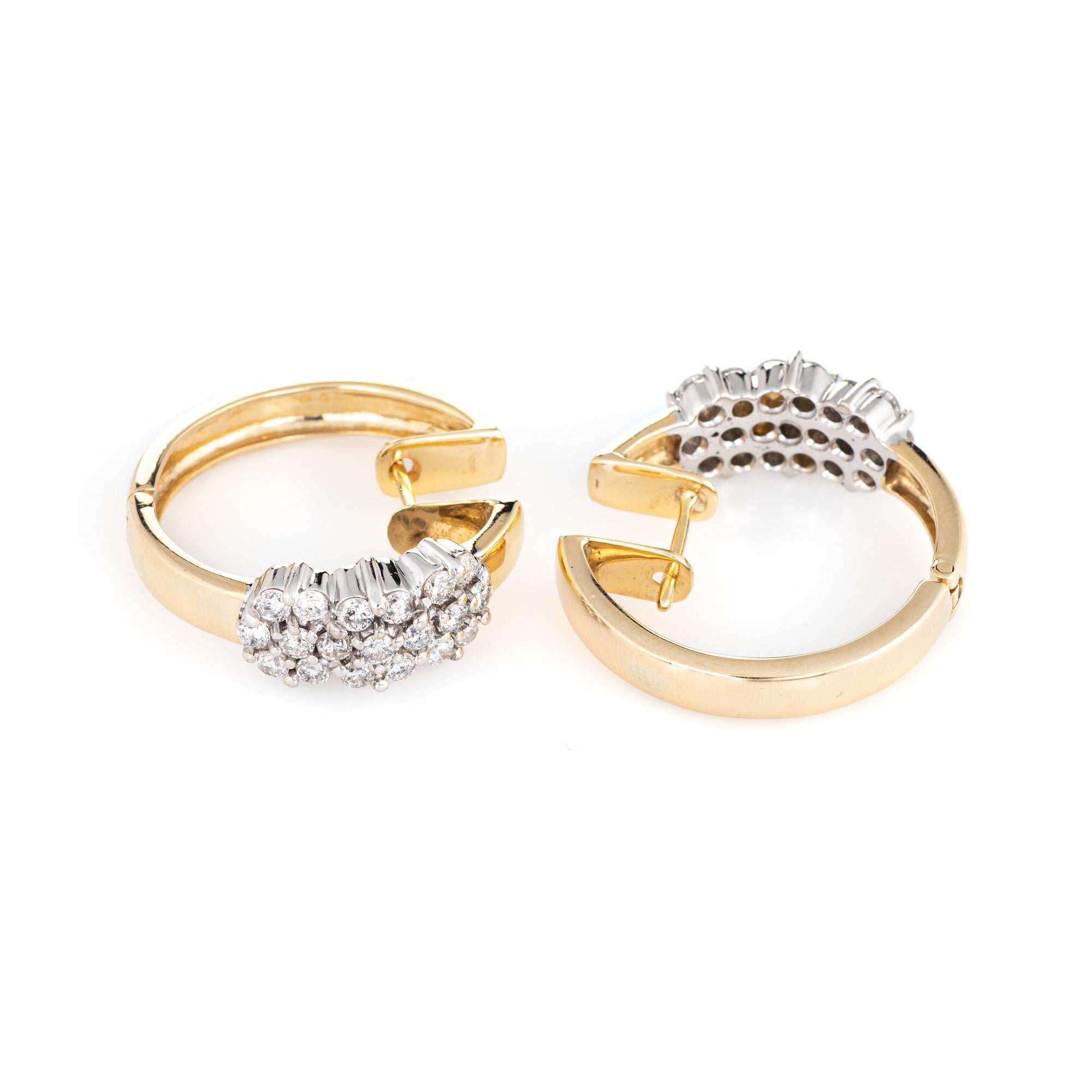 Stylish vintage diamond hoop earrings crafted in 14k yellow gold. 

Round brilliant cut diamonds total an estimated 1.52 carats (estimated at H-I color and SI2-I1 clarity).  

The charming earrings are set with a cluster of diamonds in floral style