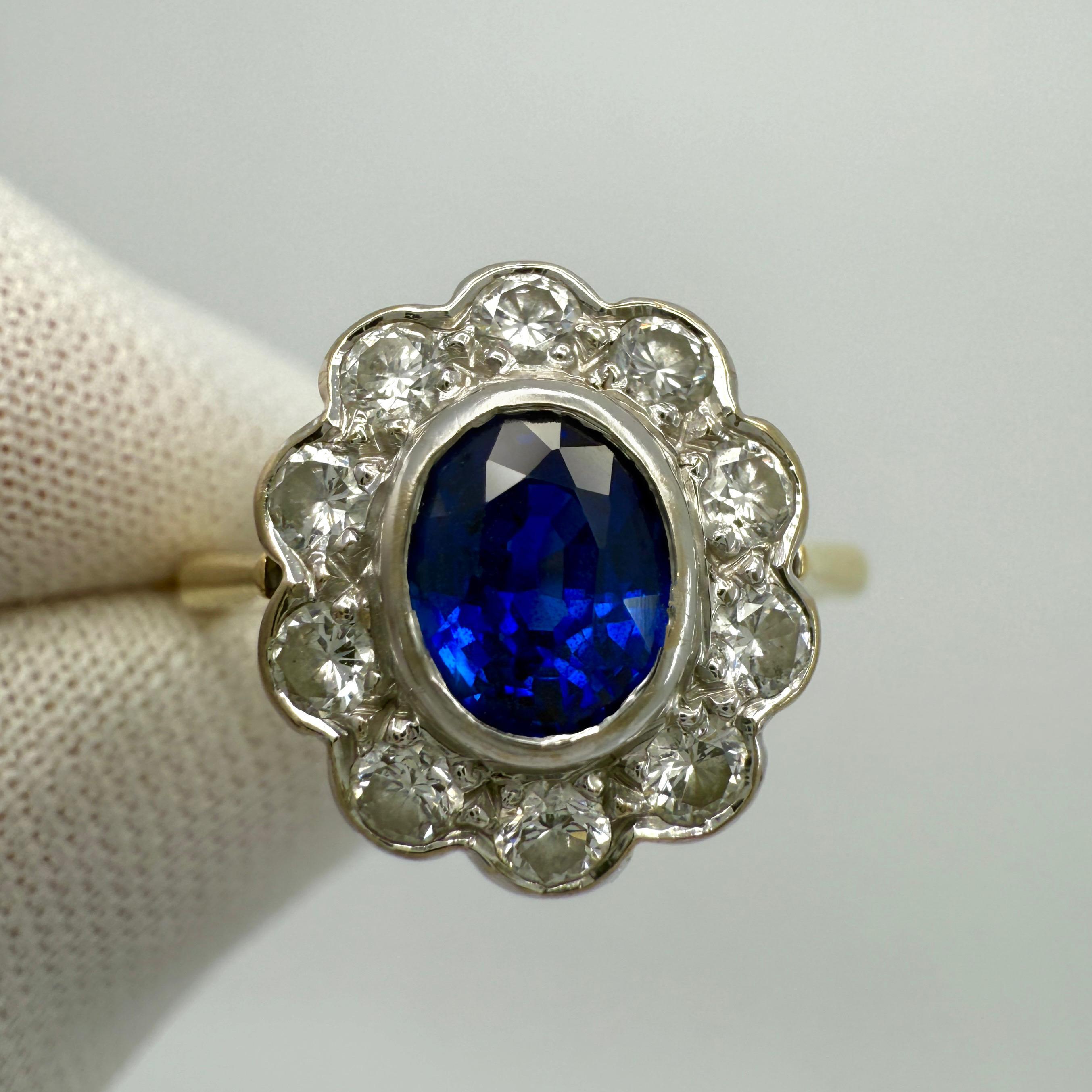Vintage Vivid Cornflower Blue Ceylon Sapphire & Diamond 18k White & Yellow Gold Cluster Ring.
1.52 Carat total.

This beautiful vintage cluster ring features a fine natural Ceylon sapphire with a vivid cornflower blue colour and an excellent oval
