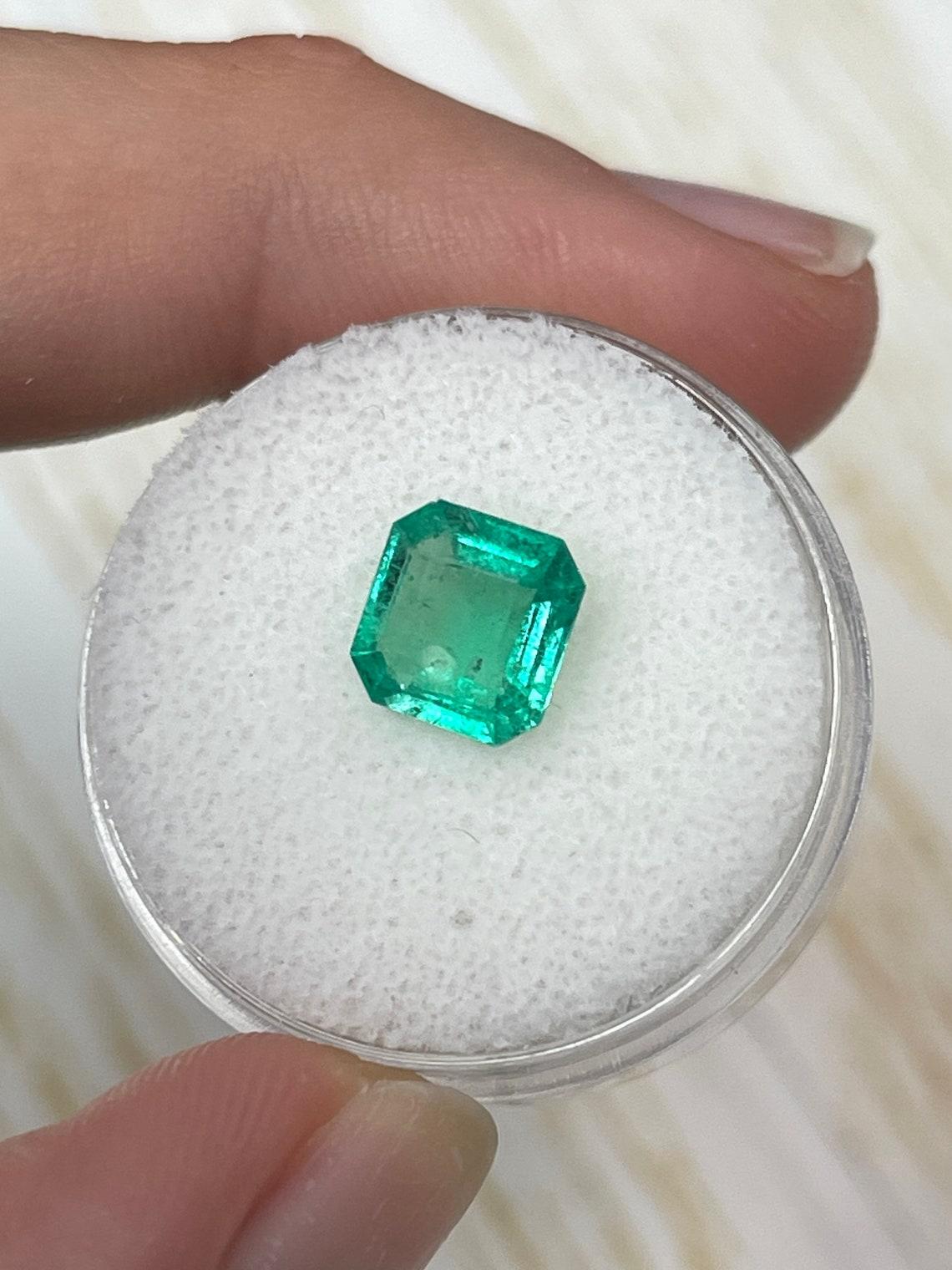 Modern 1.53 Carat 8x8 Yellowish Green Colombian Emerald - Rare Asscher Cut May For Sale