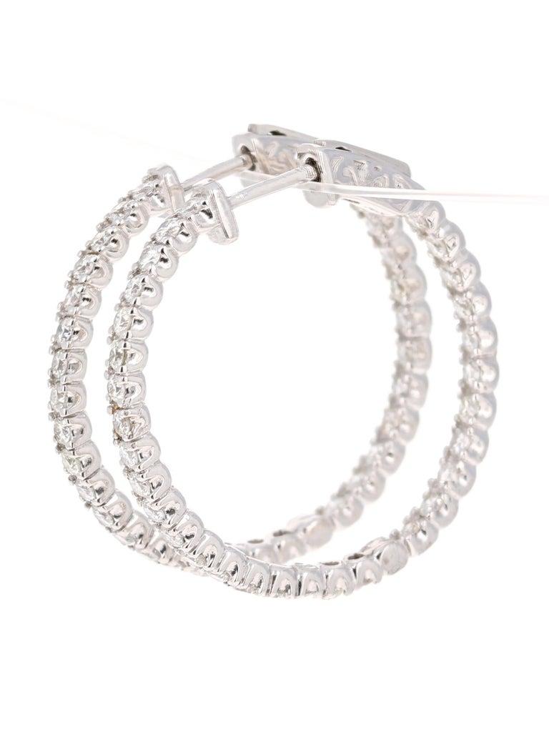 These gorgeous hoop earrings are ideal as everyday earrings or even for those special night outs. 

These earrings have 60 Round Cut Diamonds aligned both on the inside and outside of the hoop and weigh a total of 1.53 Carats.   They are