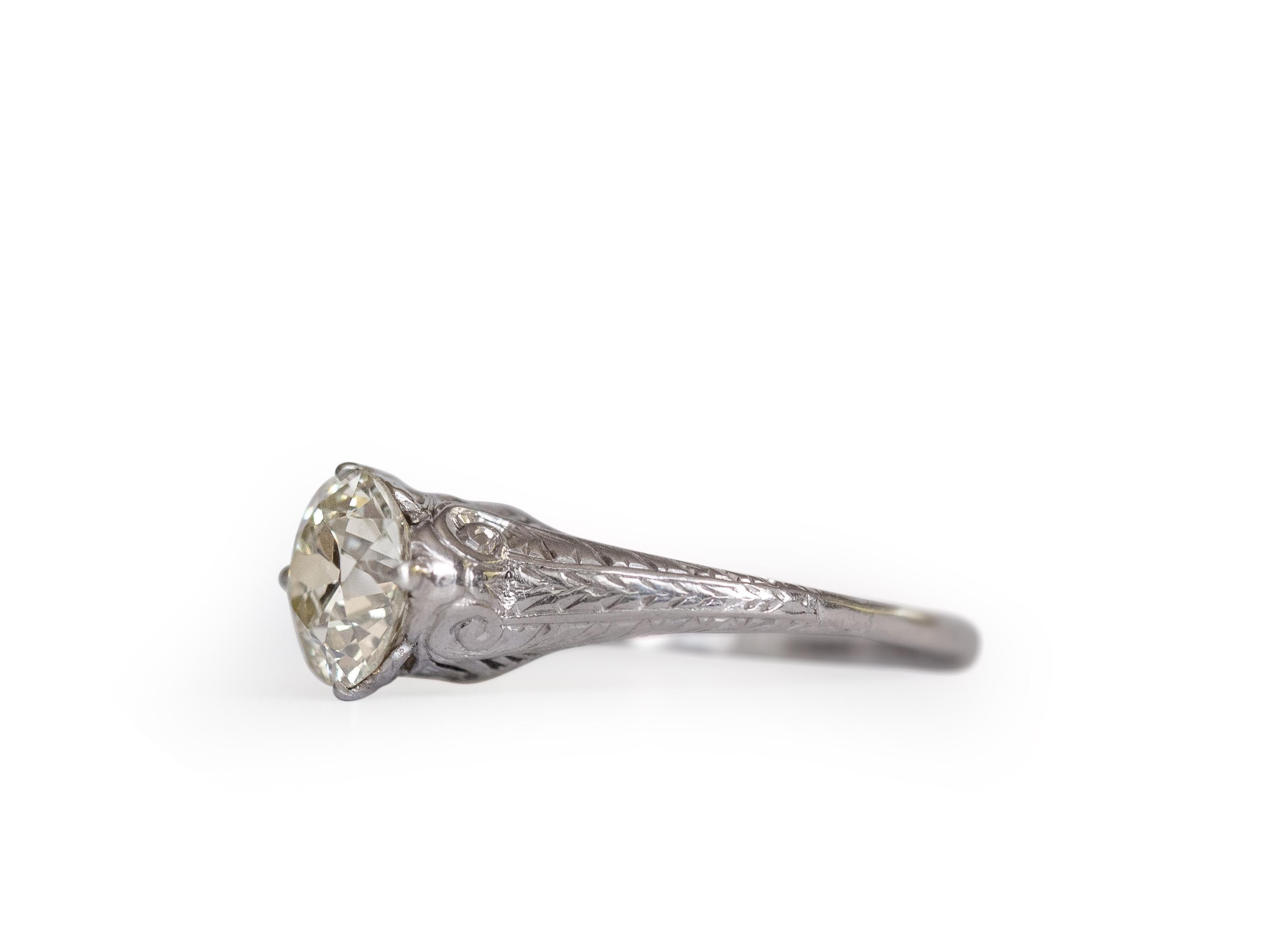 Ring Size: 7
Metal Type: Platinum [Hallmarked, and Tested]
Weight: 4 grams

Center Diamond Details:
Weight: 1.53 carat
Cut: Old European Brilliant
Color: M
Clarity: VS1

Finger to Top of Stone Measurement: 6.5mm
Condition:  Excellent