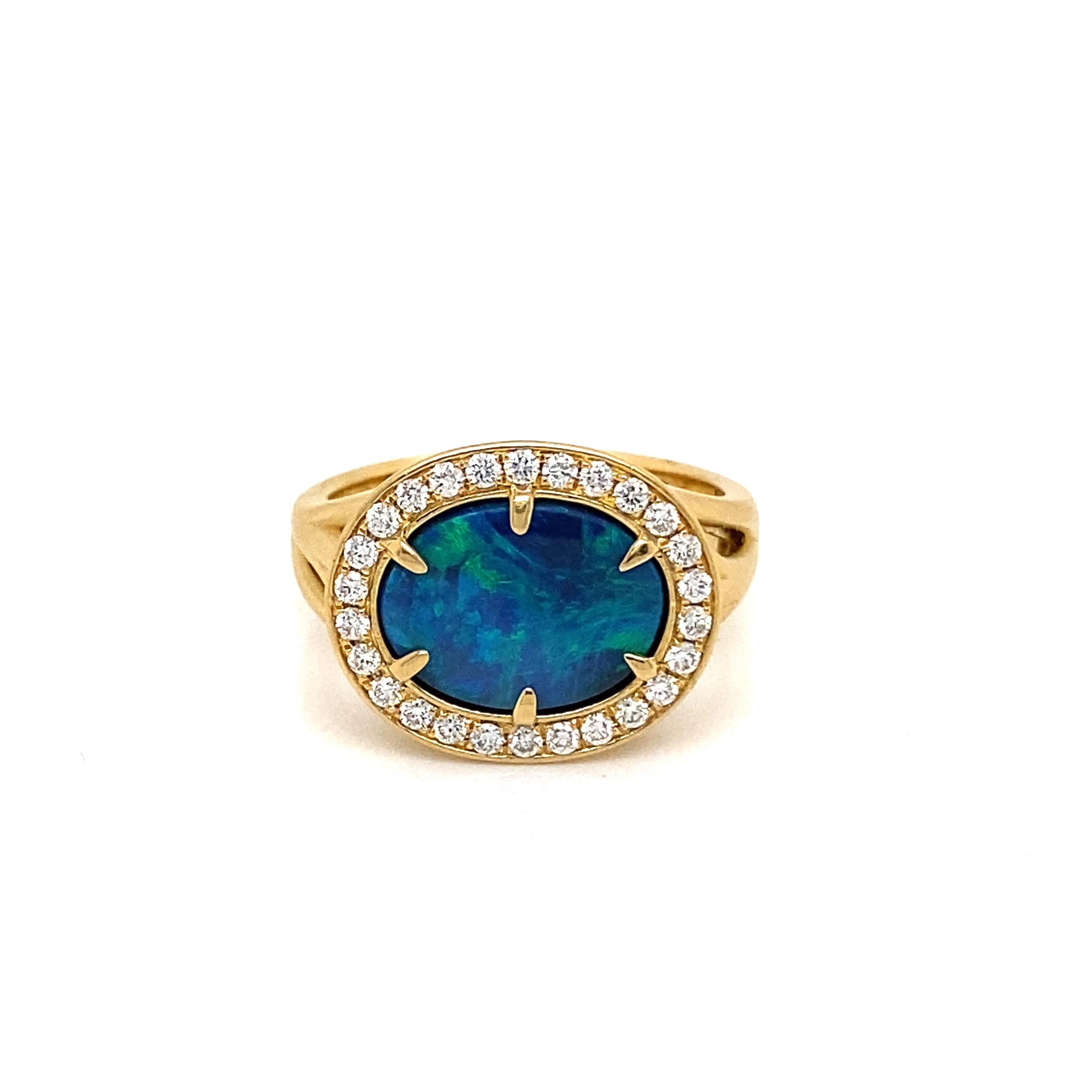 This stunning cocktail ring showcases a beautiful 1.53 Carat Lightning Ridge Oval Black Opal with a Diamond Halo on a Diamond Shank. This ring is set in 18k Yellow Gold, with 18k yellow gold prongs on the center stone.
Total Diamond Weight = 0.12