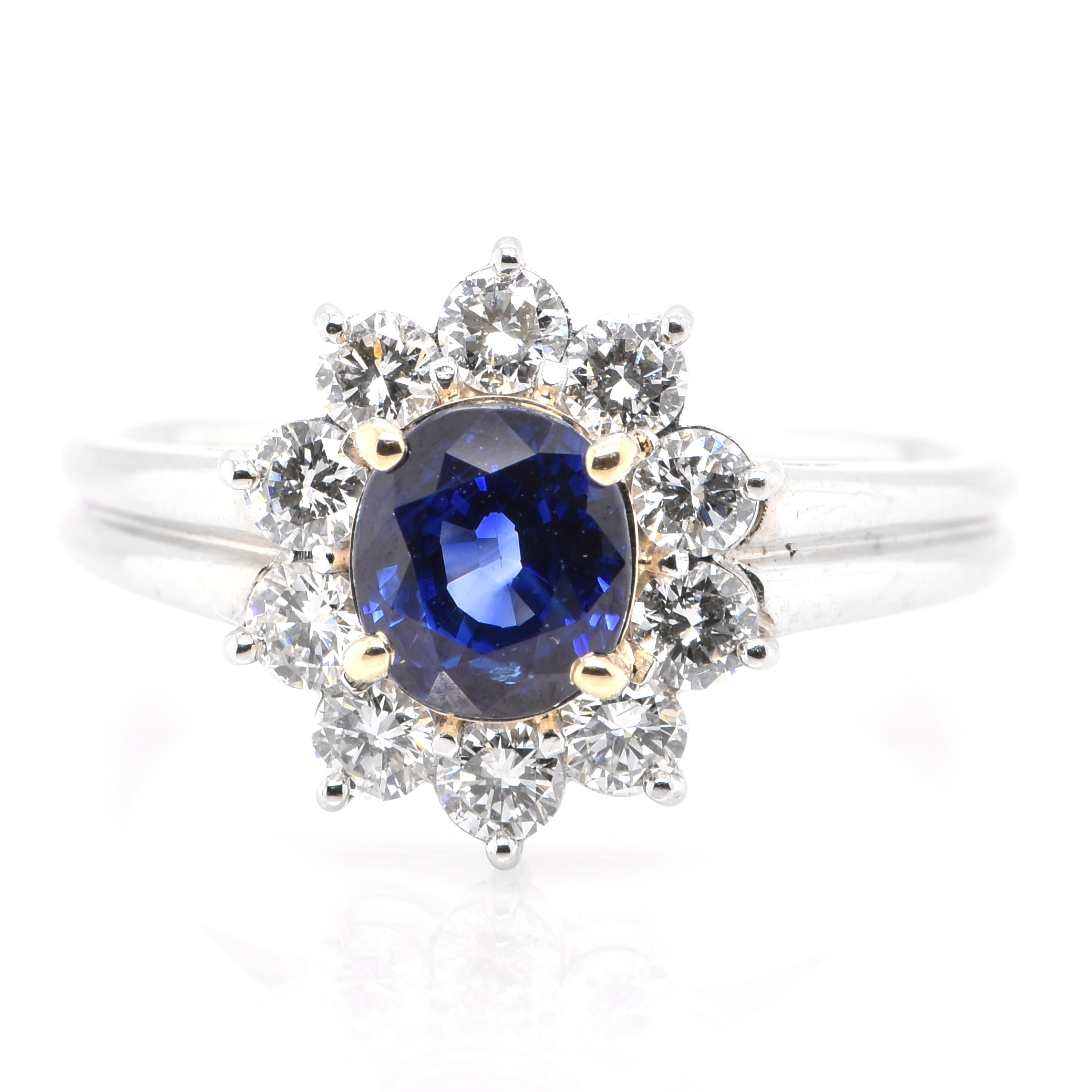 A beautiful ring featuring a 1.53 Carat Natural Blue Sapphire and 0.58 Carats Diamond Accents set in Platinum and 18K Gold. Sapphires have extraordinary durability - they excel in hardness as well as toughness and durability making them very popular