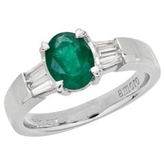 1.53 Carat Oval Cut Emerald and Diamond Ring 18 Karat White Gold