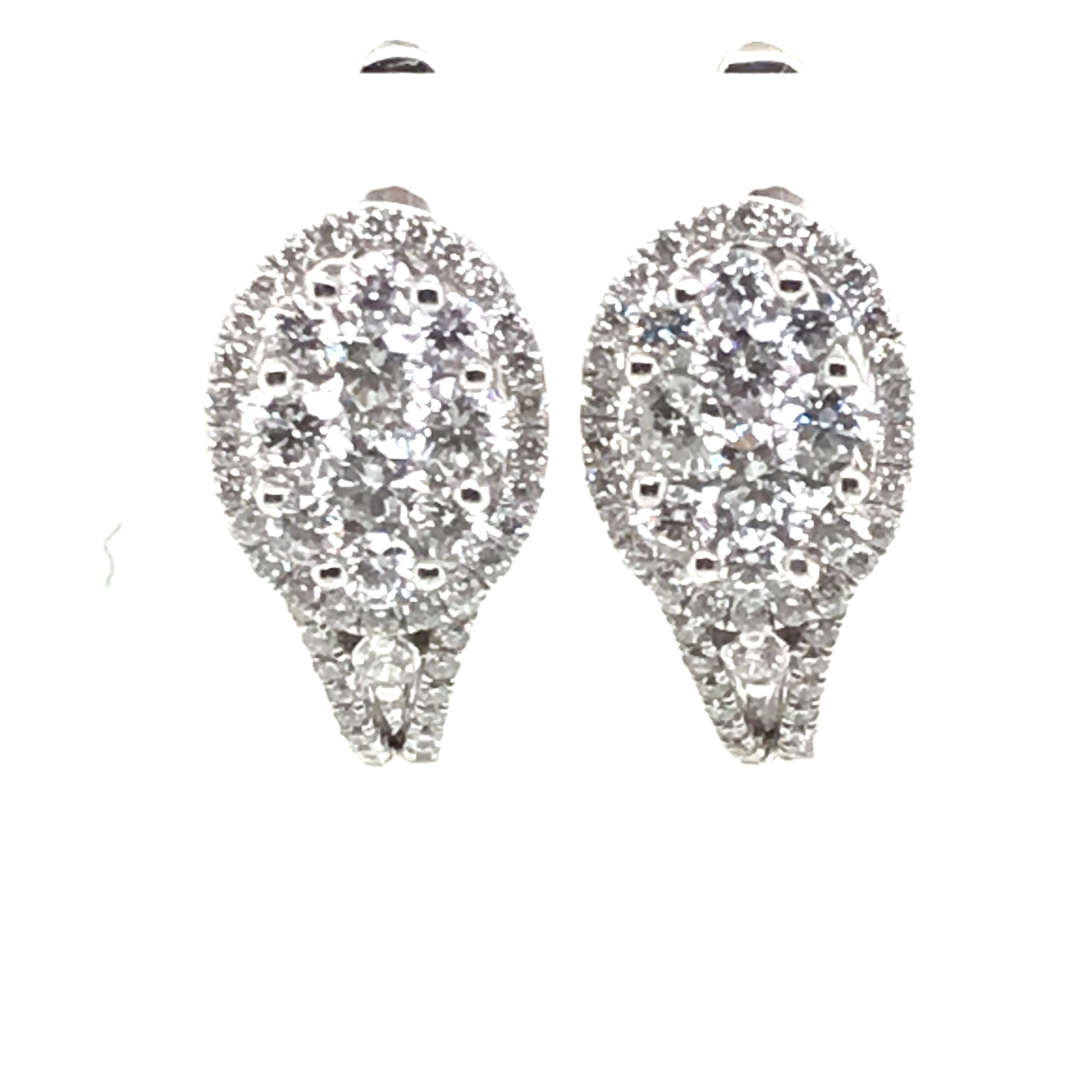 HJN Inc. Ring featuring an Oval Shape Round Diamond Earrings with Round Halos

Round-Cut Diamond Weight: 1.53 Carats

Total Stones: 118
Clarity Grade: SI1
Color Grade: H
Total Diamond Weight: 1.53 Carats
Polish and Symmetry: Very Good
Style Number: