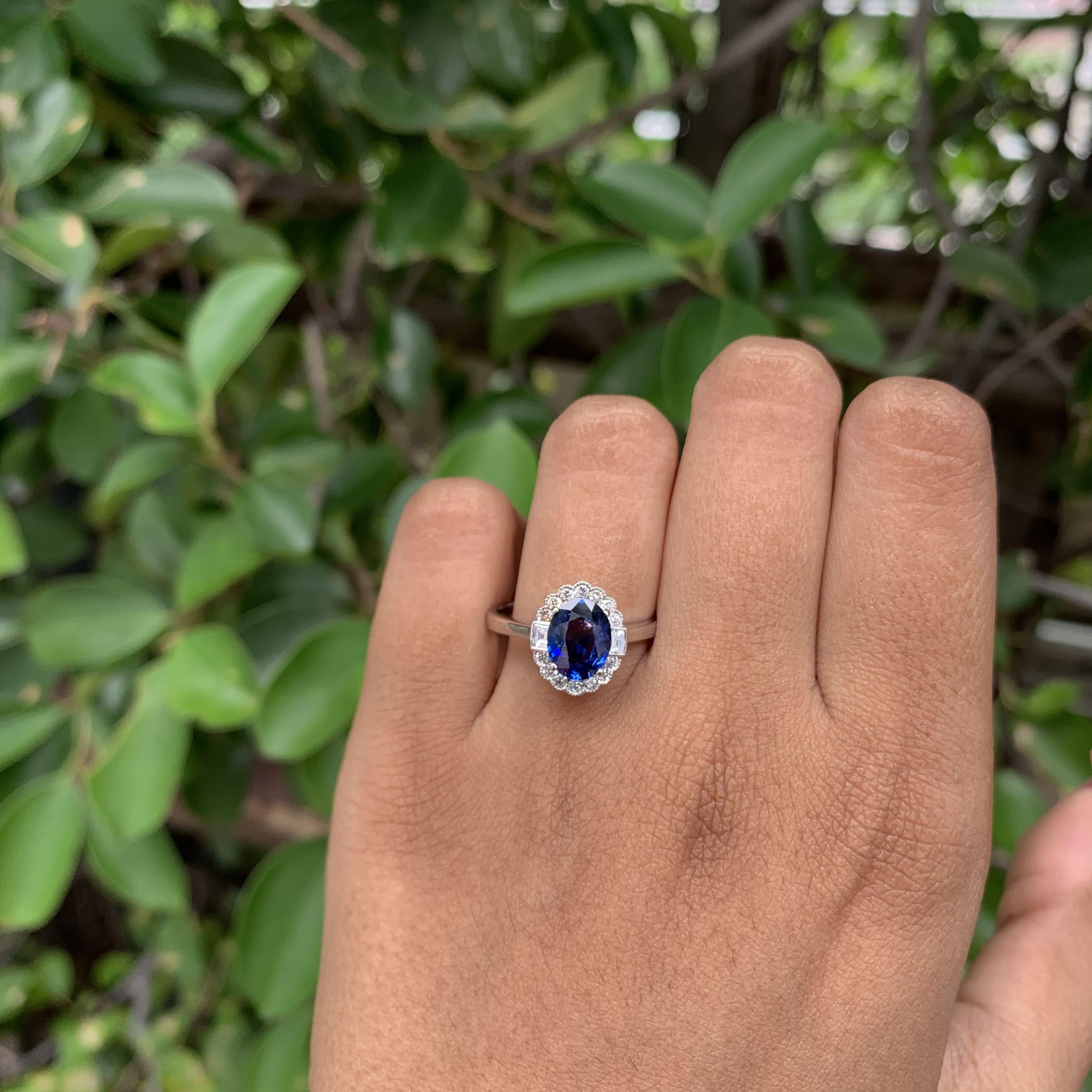 1.53 Carat Royal Blue Ceylon Sapphire Ring with Halo Diamonds in 18K Gold For Sale 5
