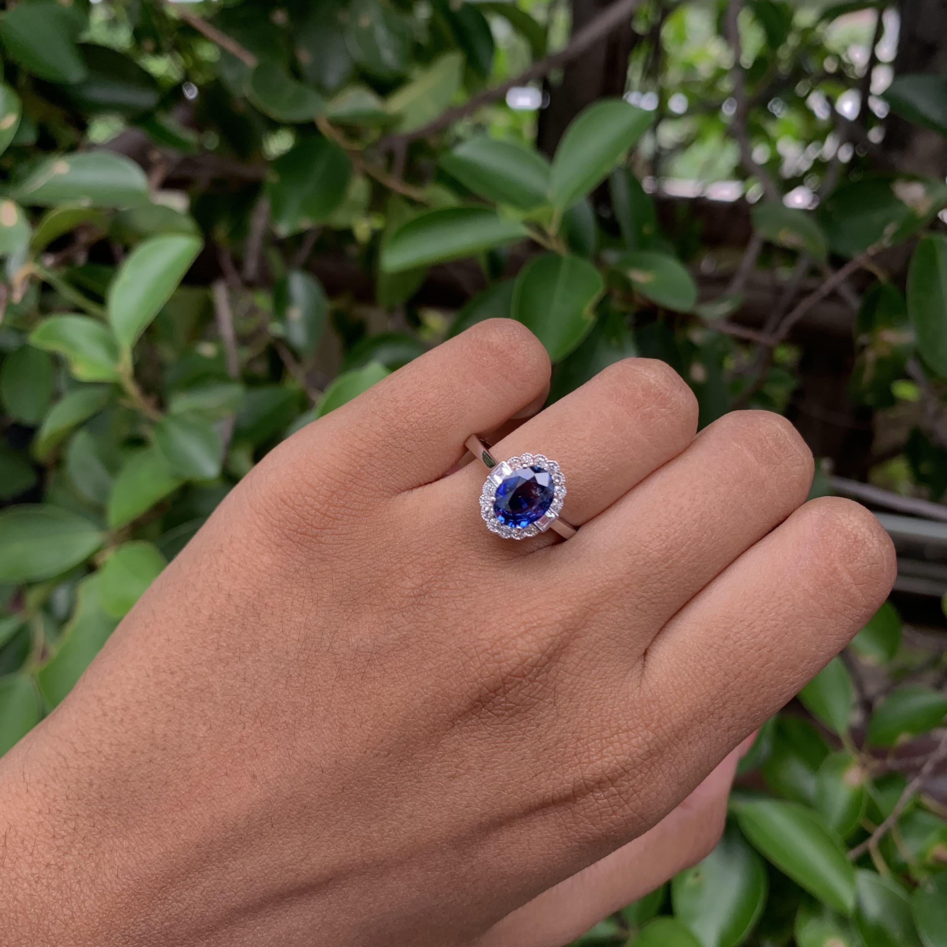 1.53 Carat Royal Blue Ceylon Sapphire Ring with Halo Diamonds in 18K Gold For Sale 6