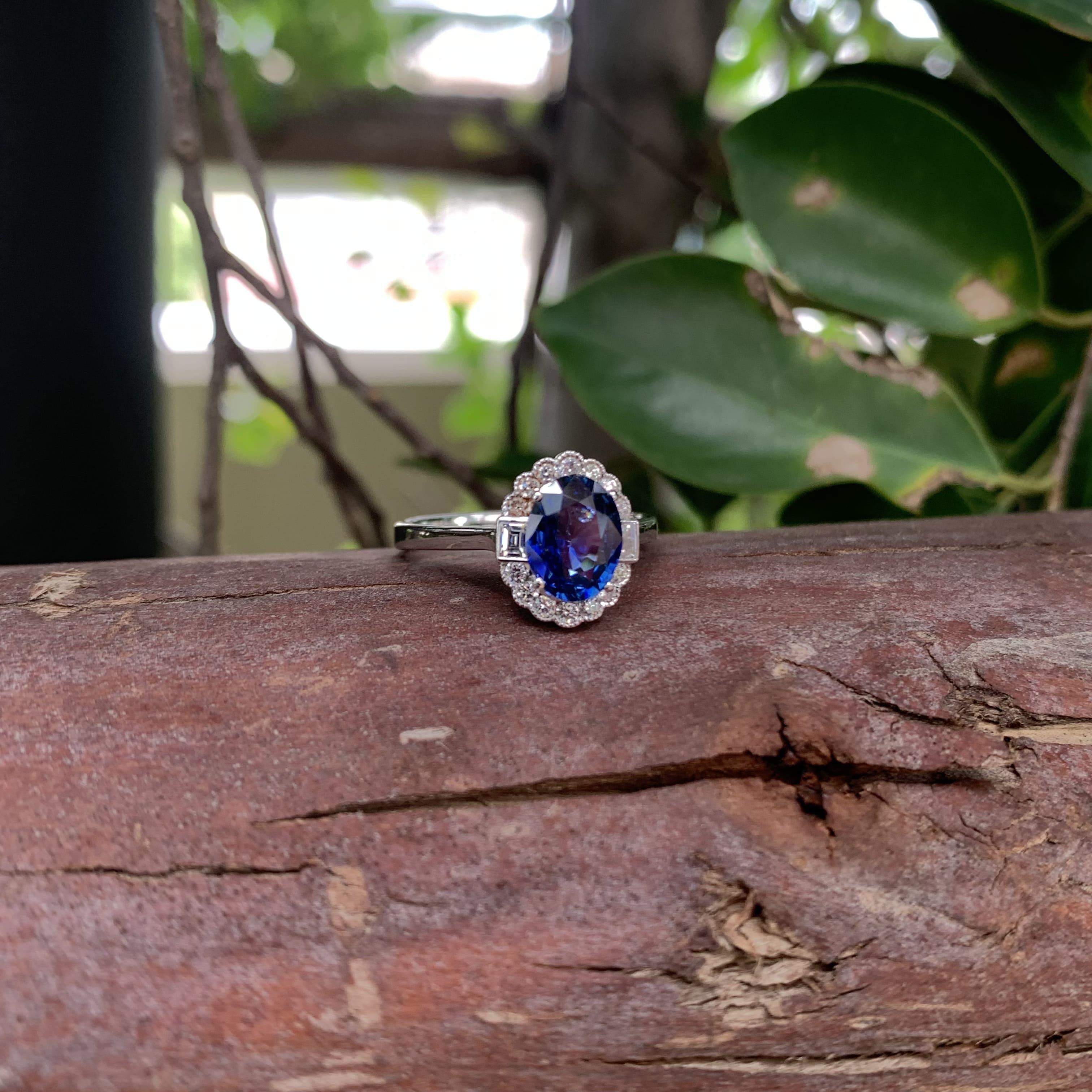 1.53 Carat Royal Blue Ceylon Sapphire Ring with Halo Diamonds in 18K Gold For Sale 7