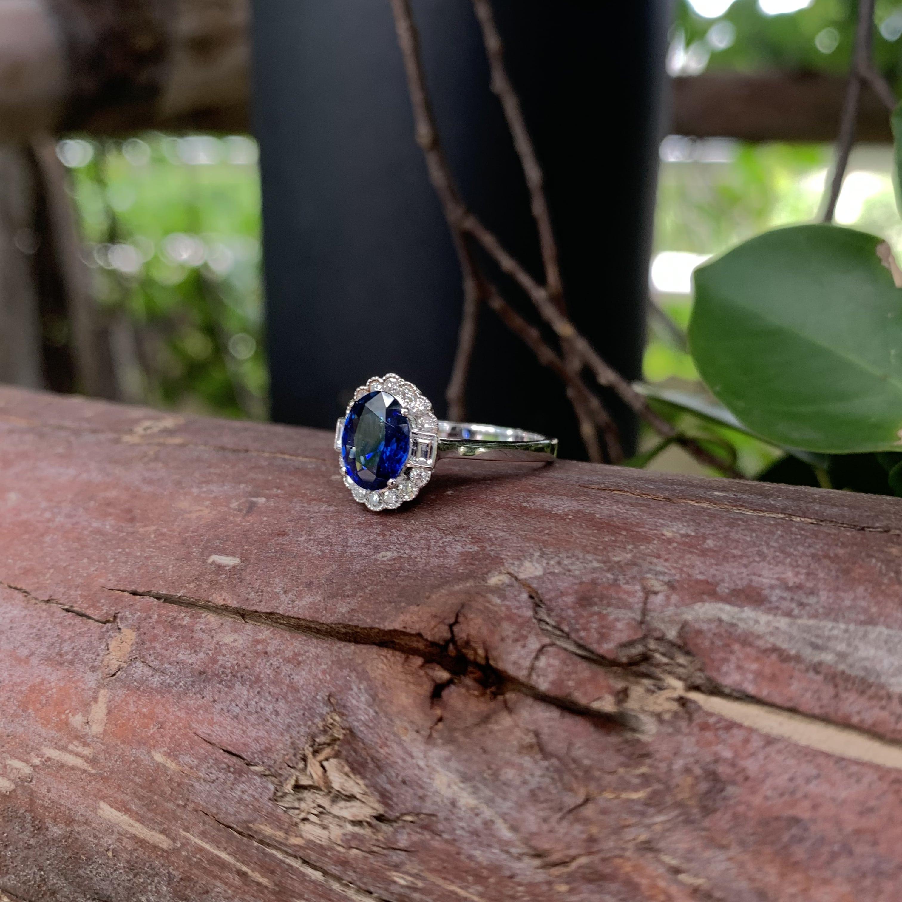 1.53 Carat Royal Blue Ceylon Sapphire Ring with Halo Diamonds in 18K Gold For Sale 8