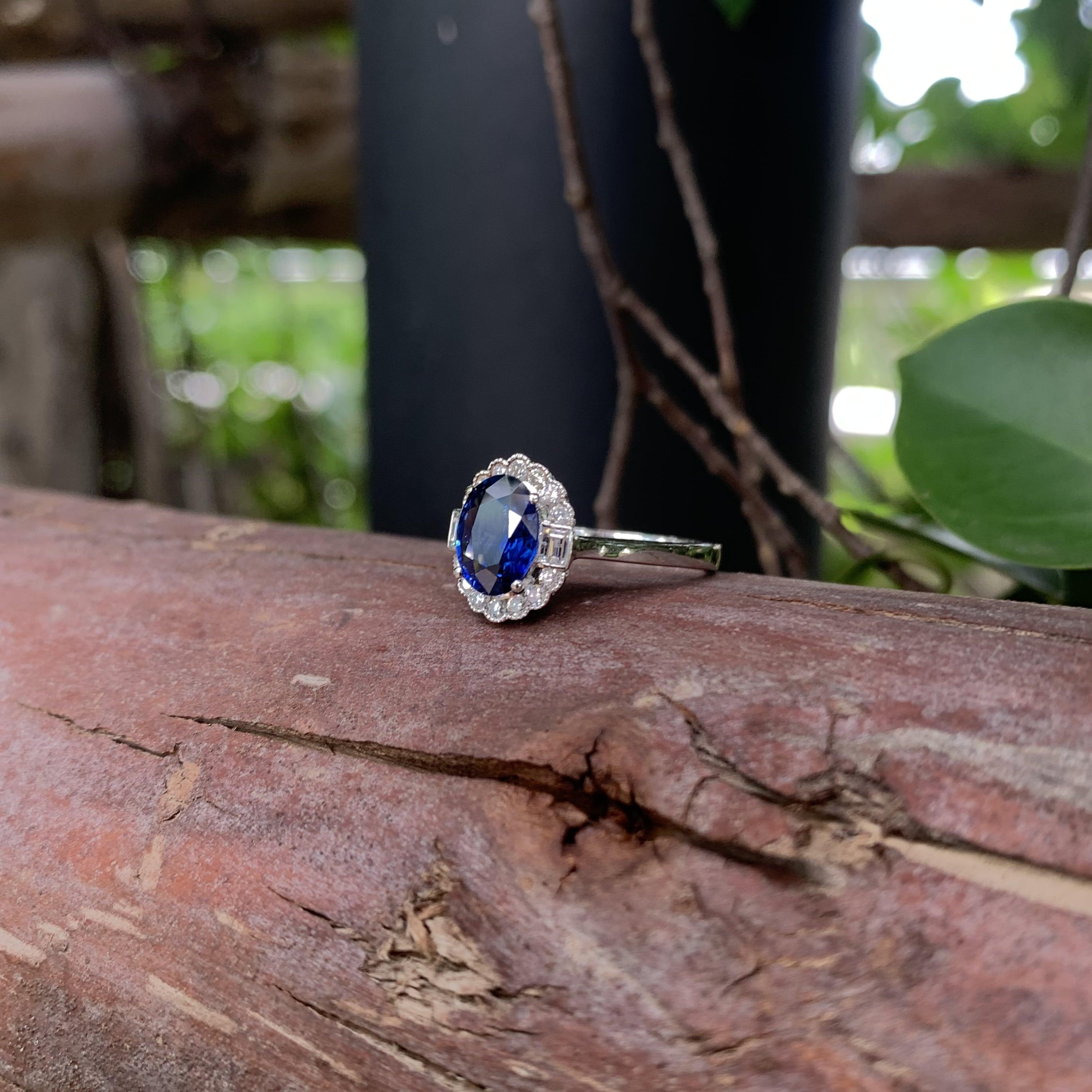1.53 Carat Royal Blue Ceylon Sapphire Ring with Halo Diamonds in 18K Gold For Sale 9