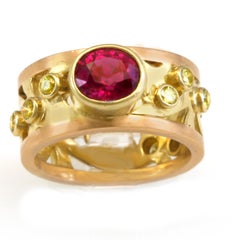 1.53 Intense Color Pink Sapphire on 18k Green Gold and Rose Gold Scrollwork Band