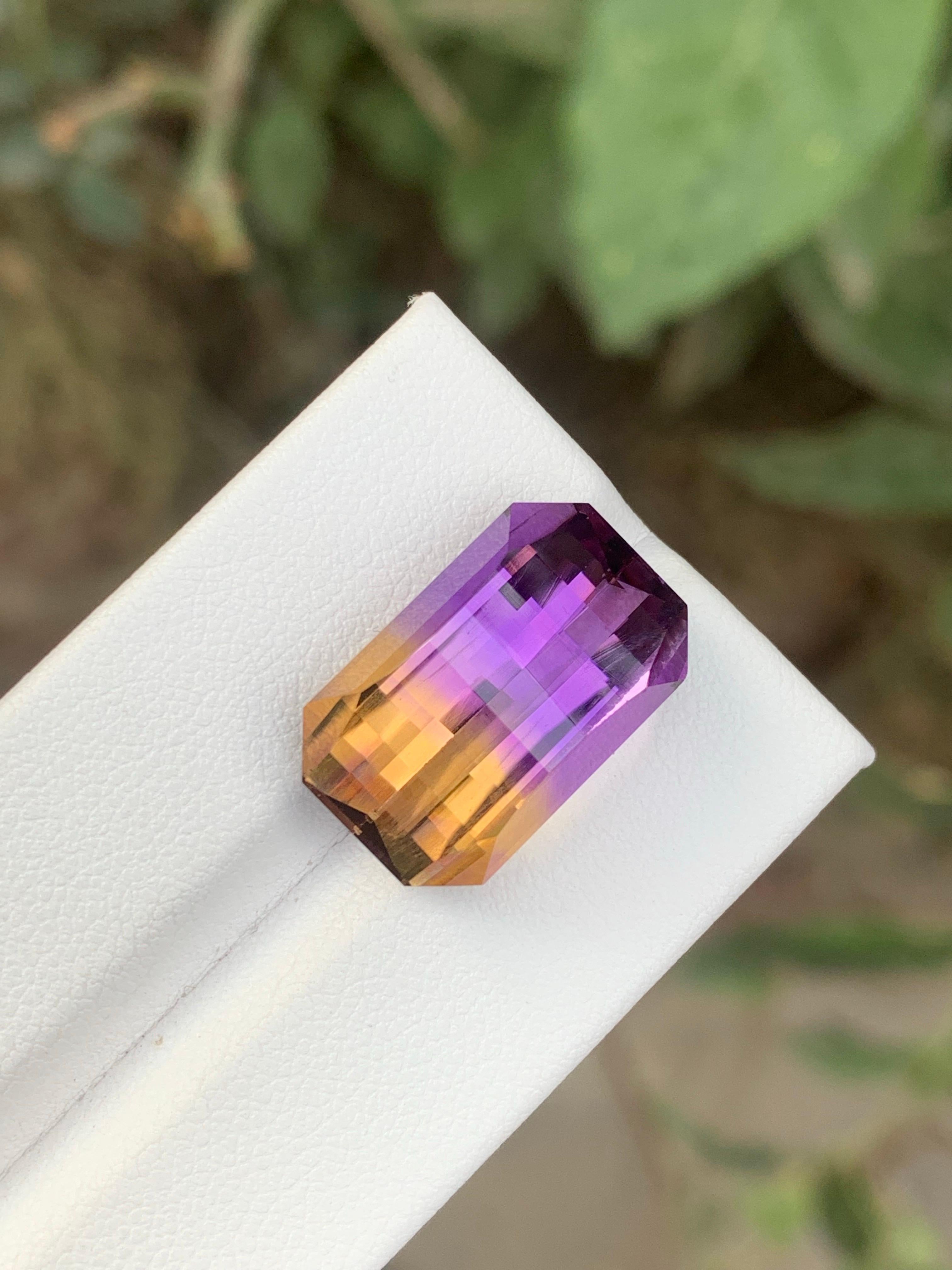 Faceted Ametrine

Weight: 15.30 Carats
Dimension: 19 x 11.9 x 9.5 Mm
Shape: Emerald 
Cut: Pixel 
Color: Purple & Yellow
Treatment: Non
Certificate: On Client Demand
.
Ametrine is a unique and striking gemstone that combines both amethyst and citrine