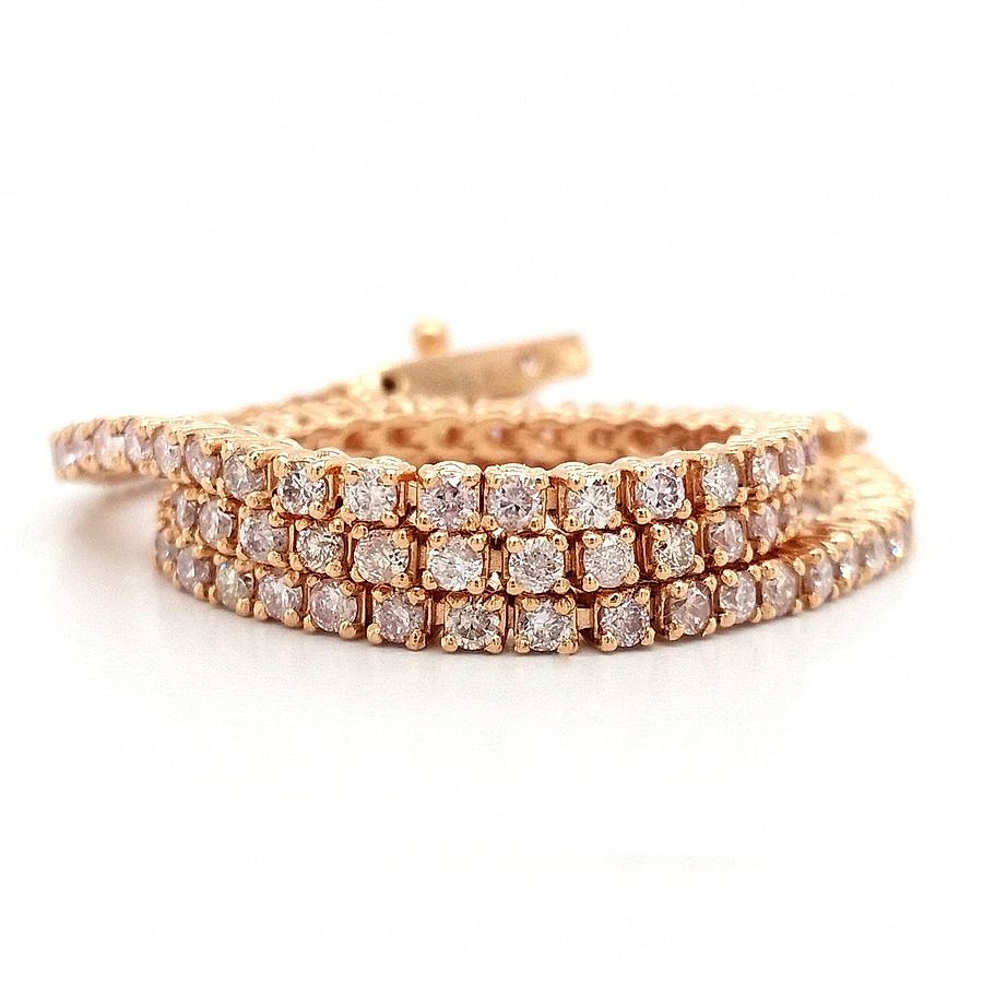 FOR U.S. BUYERS NO VAT 

This breathtaking bracelet showcases 95 endlessly sparkling pink diamonds harmonically set in 14kt gold and creating very classy and elegant design. This unique bracelet is a perfect match for your beautiful outfits on any