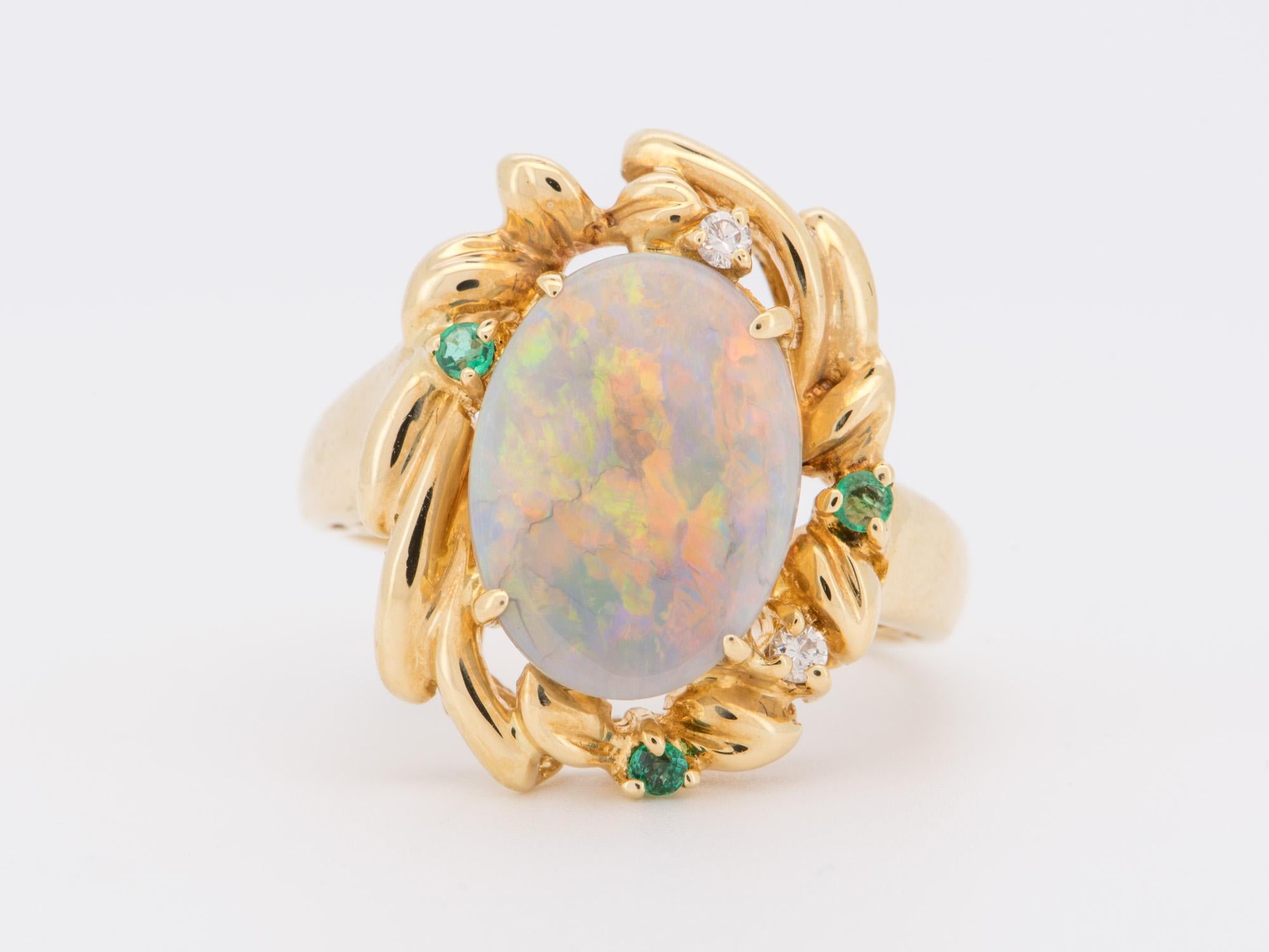♥ Solid Australian Opal Ring 18K Gold
♥ The face of the ring measures 14.8mm in width (East West direction), 18.7mm in length (North South direction), and sits 6.3mm tall from the finger. The band is 1.7mm wide.

♥ US size 5.75 (Free resizing up or