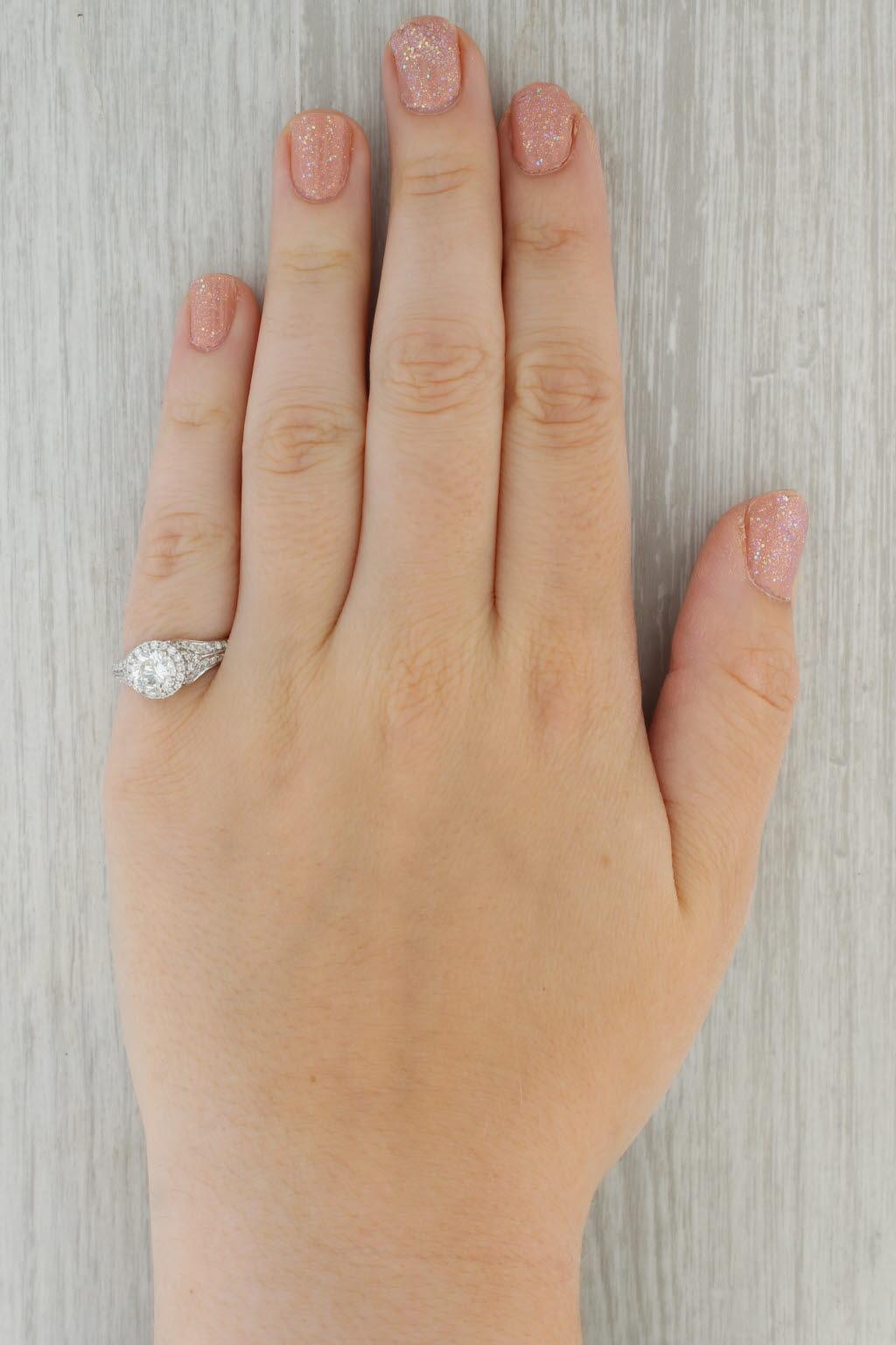 Gemstone Information:
- Natural Diamond -
Carats - 1.11ct 
Cut - Round Brilliant
Color - H - I
Clarity - I1 - I2

- Natural Diamonds -
Total Carats - 0.10ctw
Cut - Round Brilliant
Color - F - H
Clarity - SI2 - I1

- Natural Diamonds -
Total Carats -
