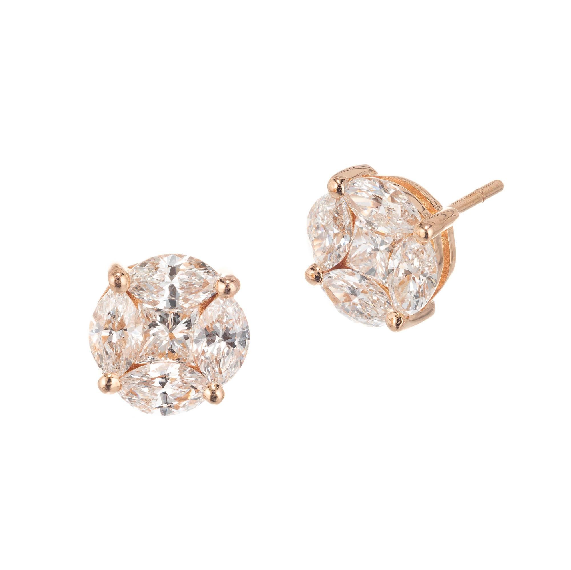 Marquise princess cut diamond cluster earrings in 18k rose gold 

8 marquise cut G-H VS diamonds, Approximate 1.20 carats 
2 princess cut G-H VS diamonds, Approximate .34 carats 
18k Rose Gold 
2.7 grams
Stamped: DC 750
Hallmark: HK
Top to Bottom: