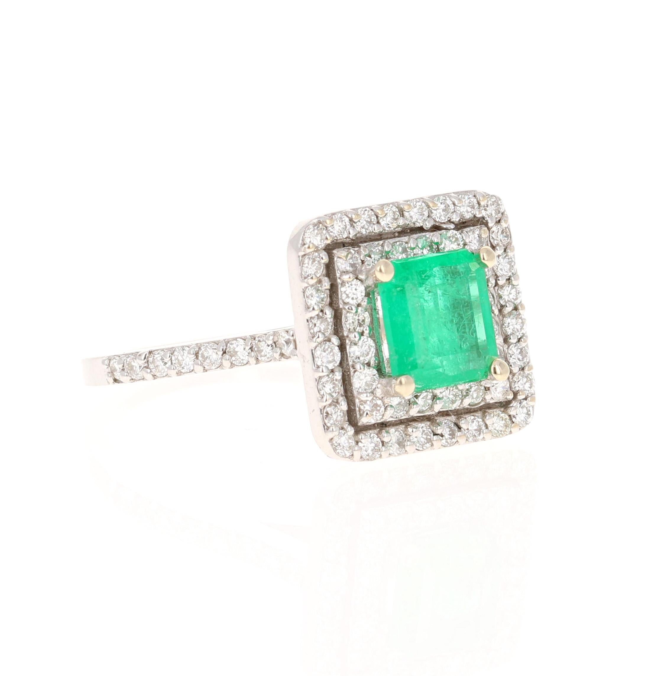 Exquisite Square-Emerald Cut Emerald Diamond Ring! 

The center is an Square Step Cut Emerald which weighs 0.93 Carats and measures.  The Emerald is surrounded by 64 Round Cut Diamonds weighing 0.61 Carats (Clarity: VS, Color: F). The total carat
