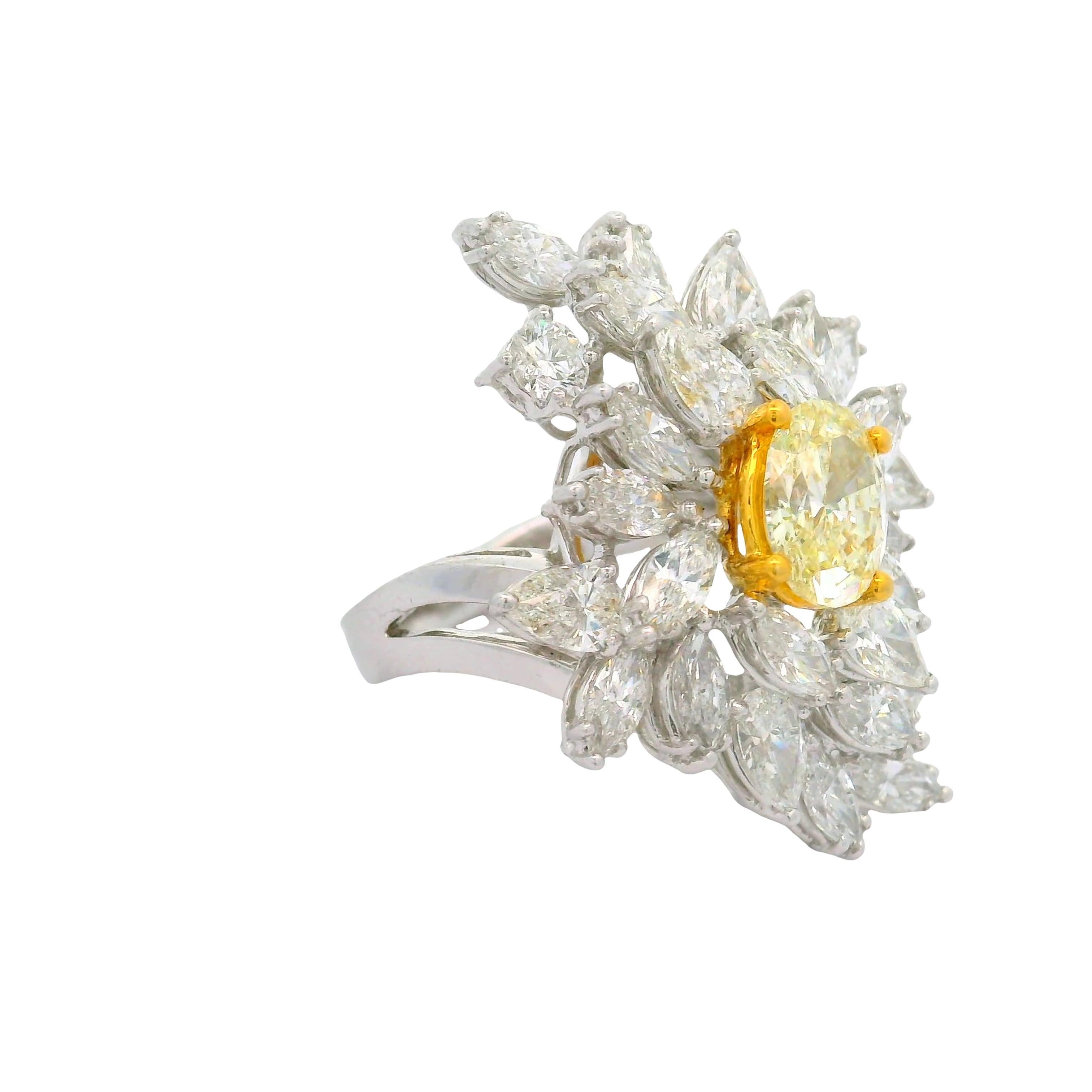 Oval Cut 1.54 Carat Fancy Yellow Oval Diamond Cluster Platinum Ring For Sale