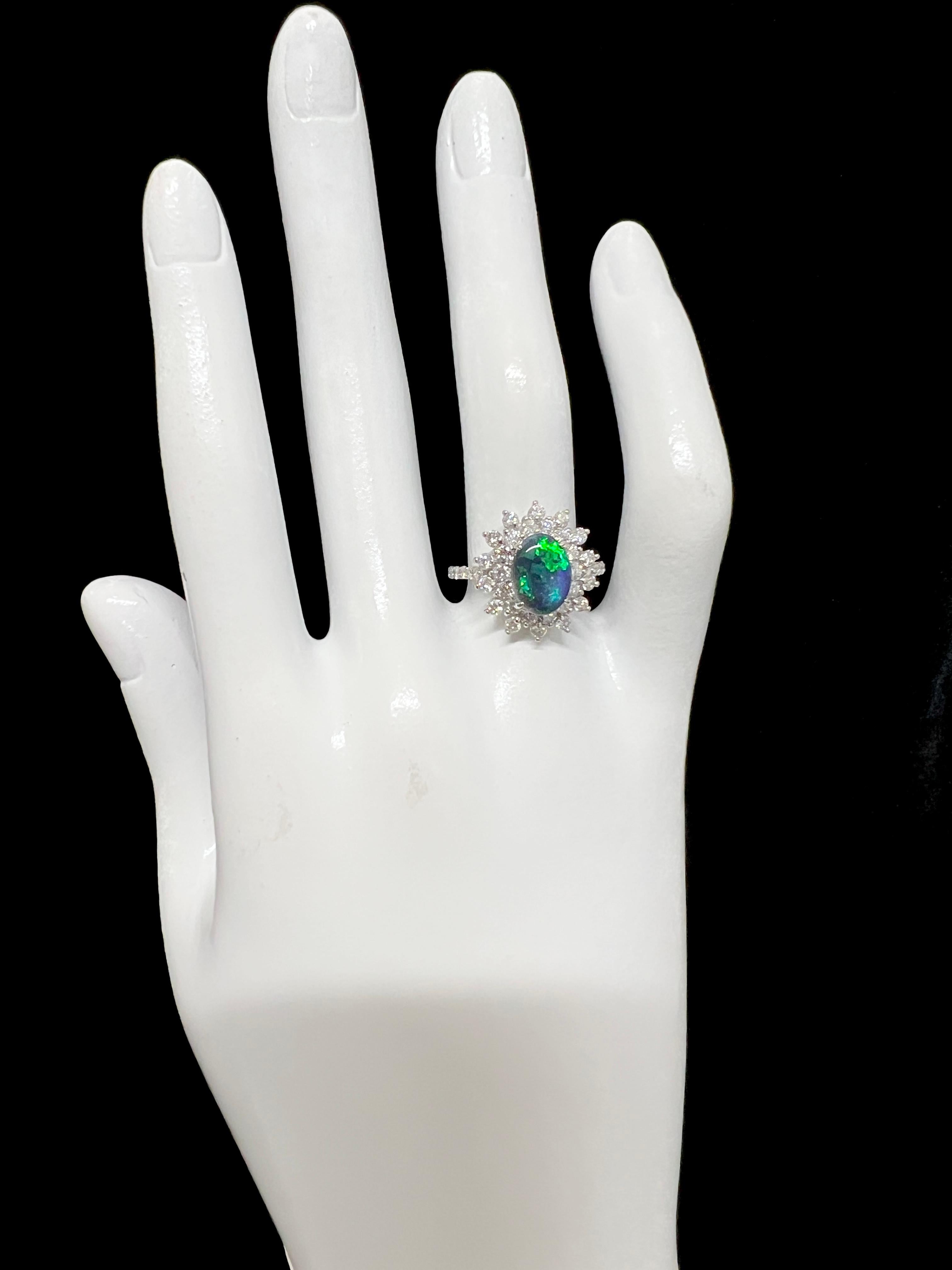 1.54 Carat Lighting Ridge Black Opal & Diamond Halo Ring Set in Platinum For Sale 1