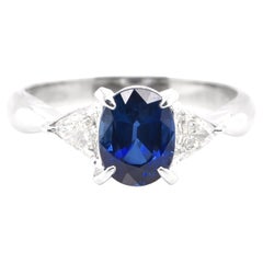 1.54 Carat Natural Blue Sapphire and Diamond Three-Stone Ring Set in Platinum