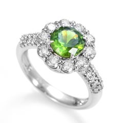 1.54 Carat Natural Demantoid Garnet and Diamond Halo Set Ring Made in Platinum