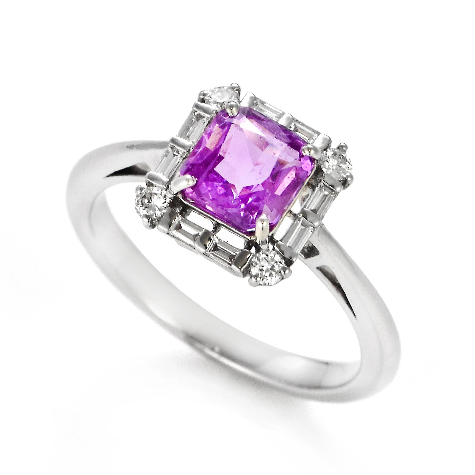 A beautiful Ring set in 18 Karat White Gold featuring a 1.54 Carat Natural Pink Sapphire and 0.25 Carat Diamonds. Sapphires have extraordinary durability - they excel in hardness as well as toughness and durability making them very popular in
