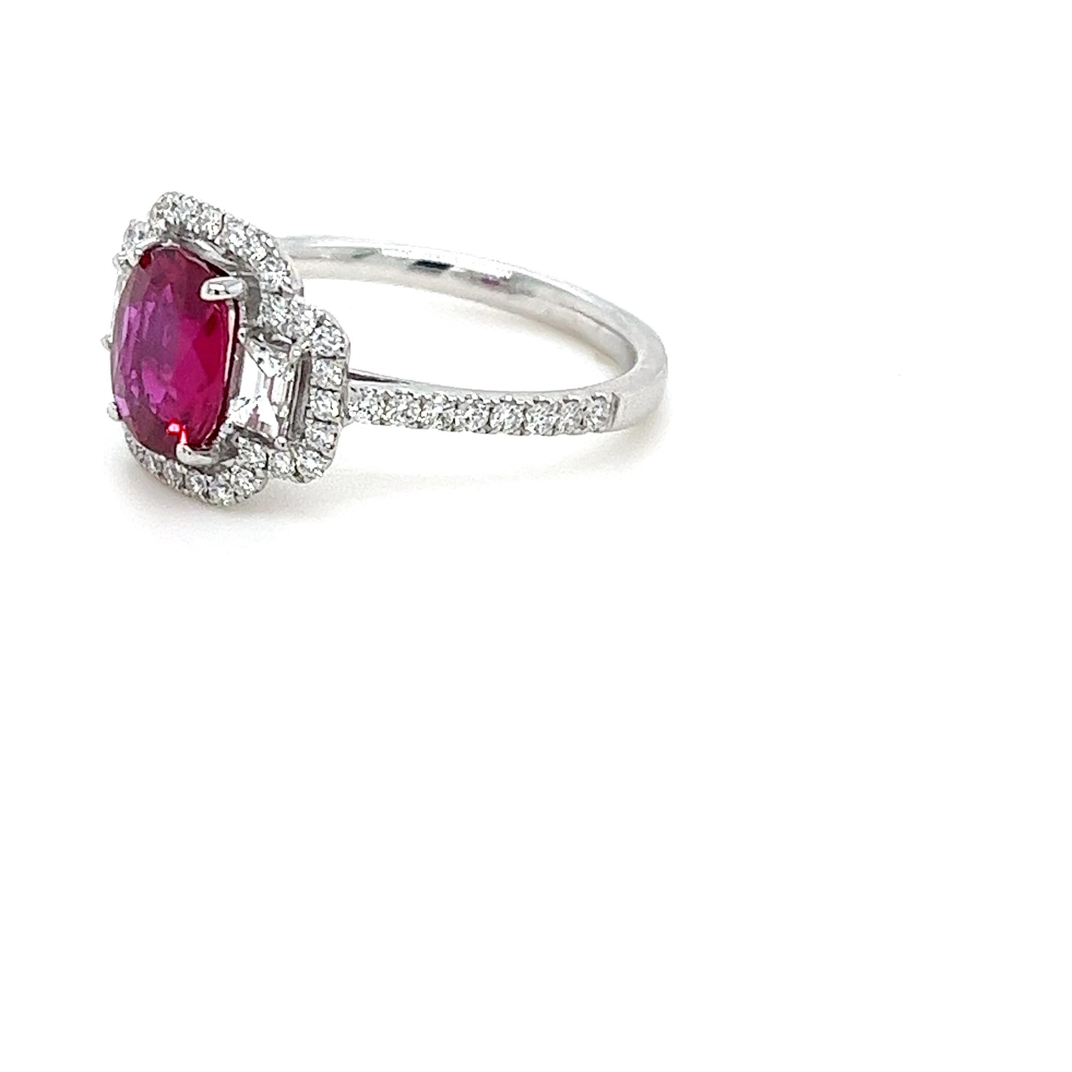 GIA Certified No Heat oval Ruby weighing 1.54 carats
Measuring (8.15x6.69x2.85) mm
Diamonds quality is H-VS2-Si1
Baguette Diamonds are .29 carats
Round Diamonds are .37 carats
Set in 18 karat white gold ring
3.43 grams