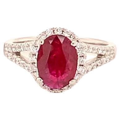 1.54 Carat Oval Cut Ruby and 0.88 Carat Diamond Ring in Platinum For Sale