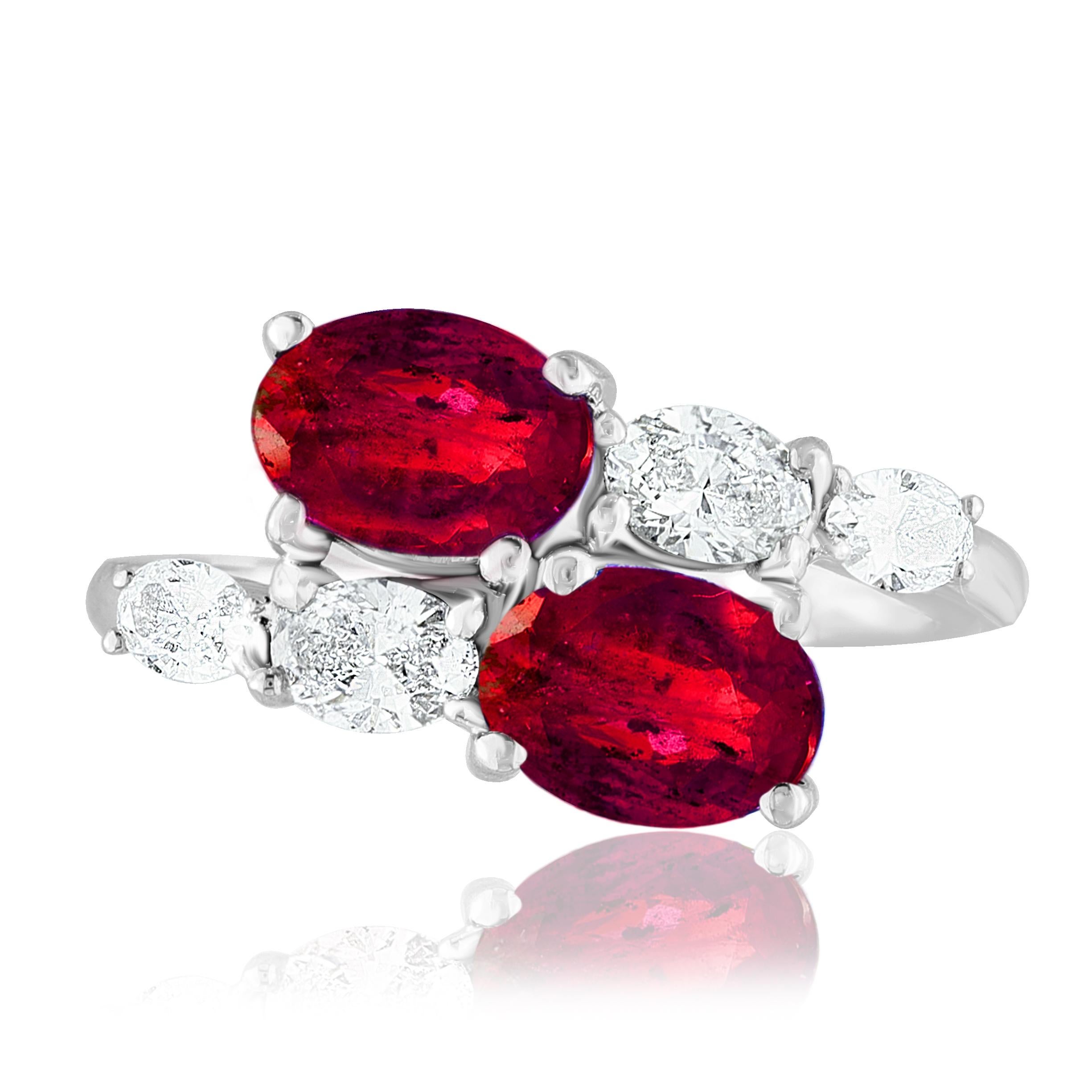 The stunning forever-together Toi et Moi ring features 2 Oval cut Rubies embraced by east to west 4 oval diamonds. Handcrafted in 14k White Gold.
2 oval Rubies in the center weigh 1.54 carats and 4 diamonds on the sides weigh 0.70 carats in total.
A