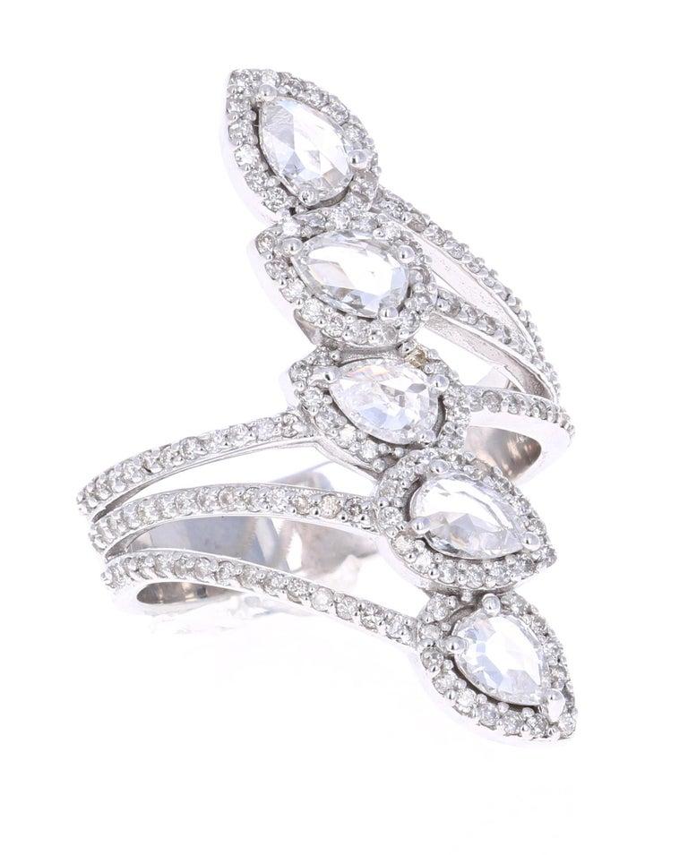 A gorgeous cocktail ring that will elevate your accessory collection of vintage and antique style jewelry! 

It has 5 Pear Cut Rose Cut Diamonds that weigh 0.92 Carats. The Rose Cut Diamonds bring out the antique and vintage style of this ring.  It