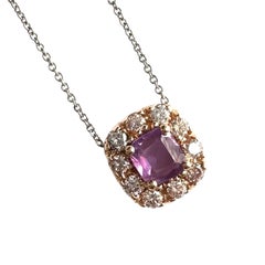 1.54 Carat Unheated Pink Sapphire and Diamond Halo Necklace, GIA-certified