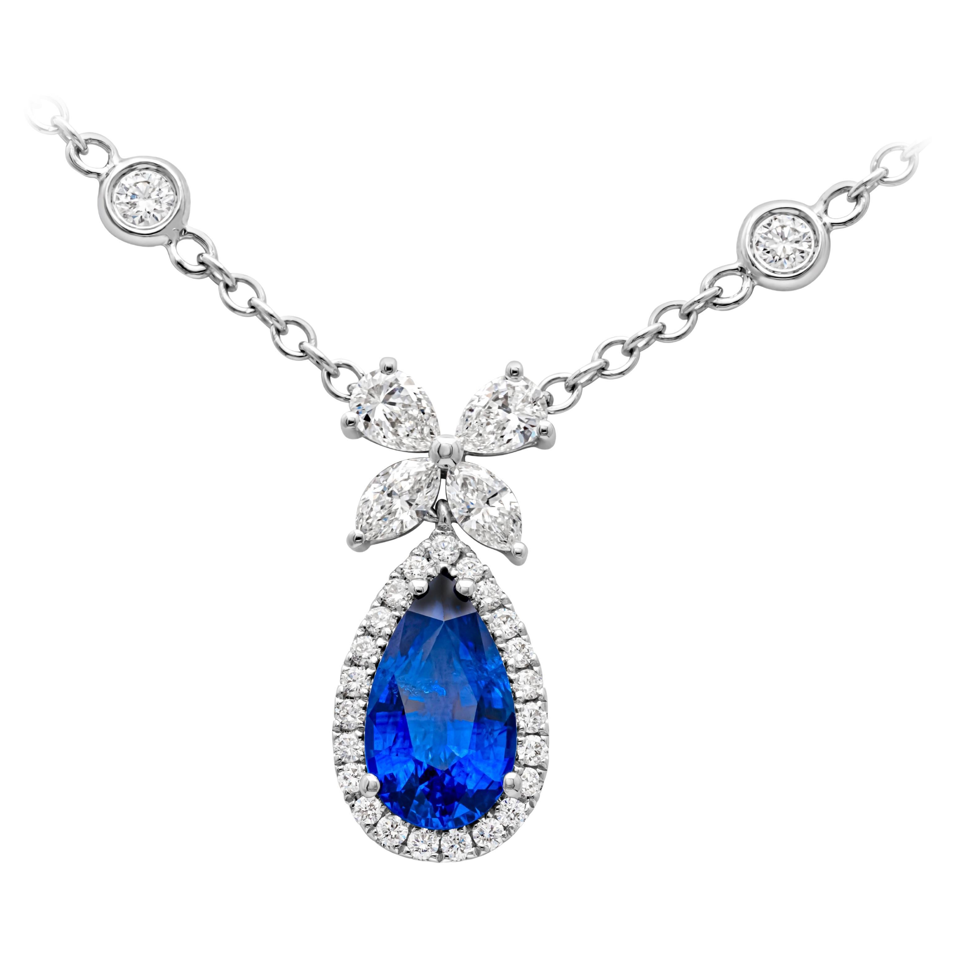 1.54 Carats Pear Shape Blue Sapphire and Mixed Diamond Pendant Necklace For Sale