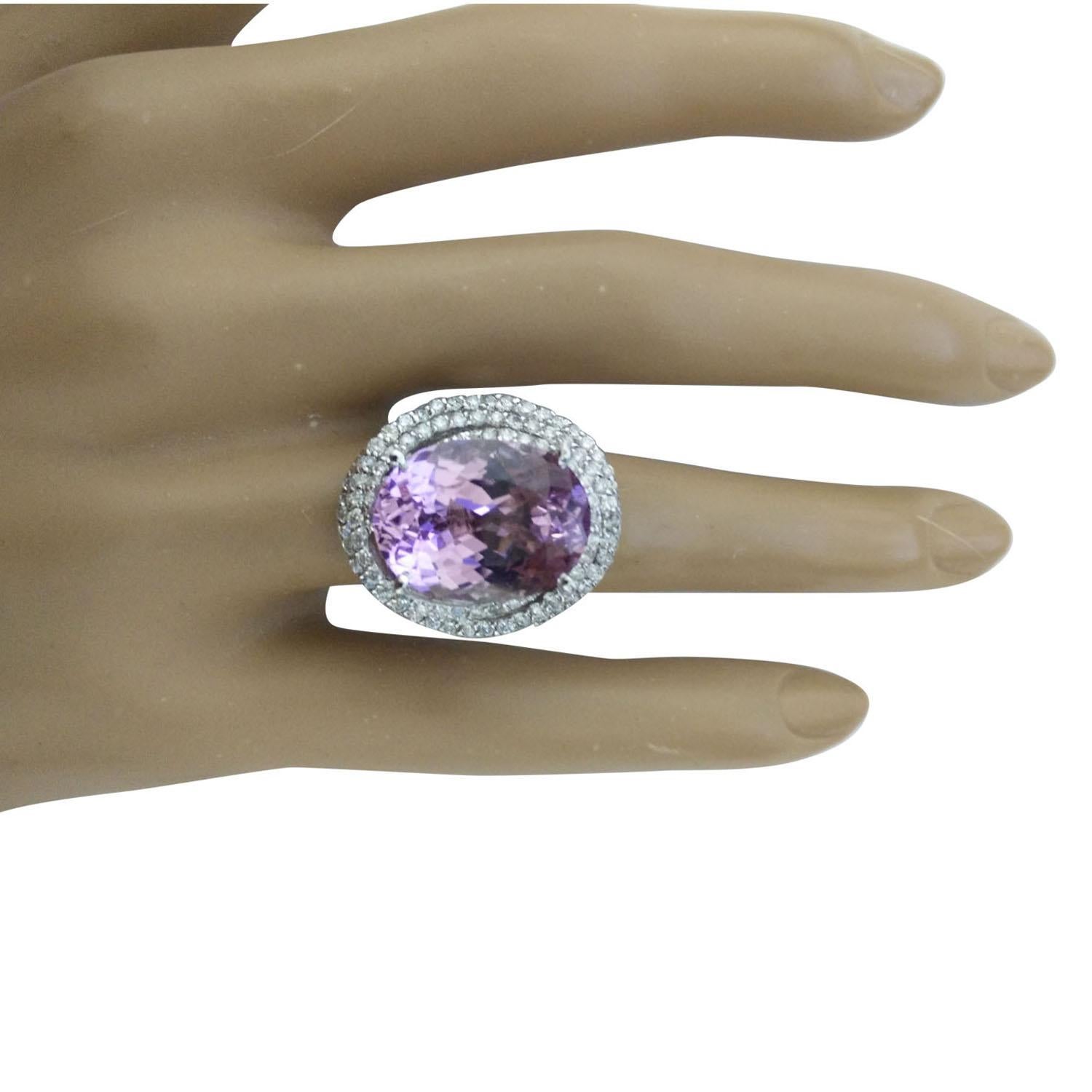 15.42 Carat Natural Kunzite 14 Karat Solid White Gold Diamond Ring
Stamped: 14K 
Ring Size: 7 
Total Ring Weight: 10.9 Grams 
Kunzite Weight: 14.22 Carat (16.00x12.00 Millimeter) 
Diamond Weight: 1.20 Carat (F-G Color, VS2-SI1 Clarity)
Face