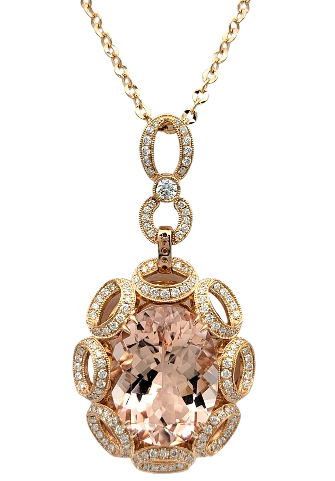 Embrace sophistication and allure with our stunning large oval cut morganite and diamond pendant necklace, expertly crafted in 14 karat rose gold. The centerpiece of this elegant piece is a mesmerizing oval cut morganite, renowned for its